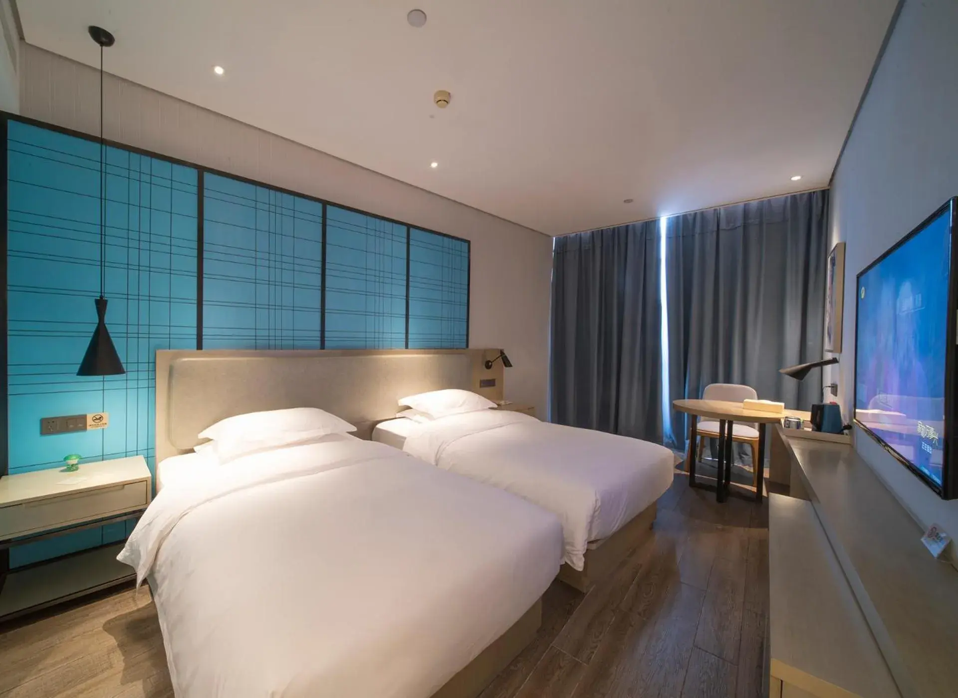 Bed in Echarm Hotel Wuhan Caidian Street Linzhang Avenue Metro Station Bed in Echarm Hotel Wuhan Caidian Street Linzhang Avenue Metro Station