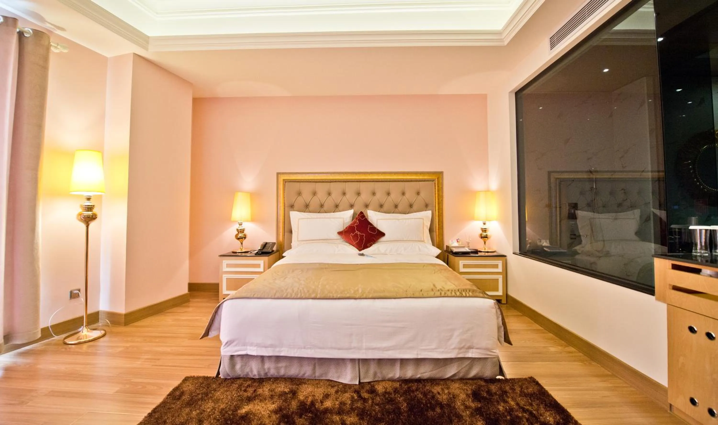 Bed in The Royal Pinnacle Hotel