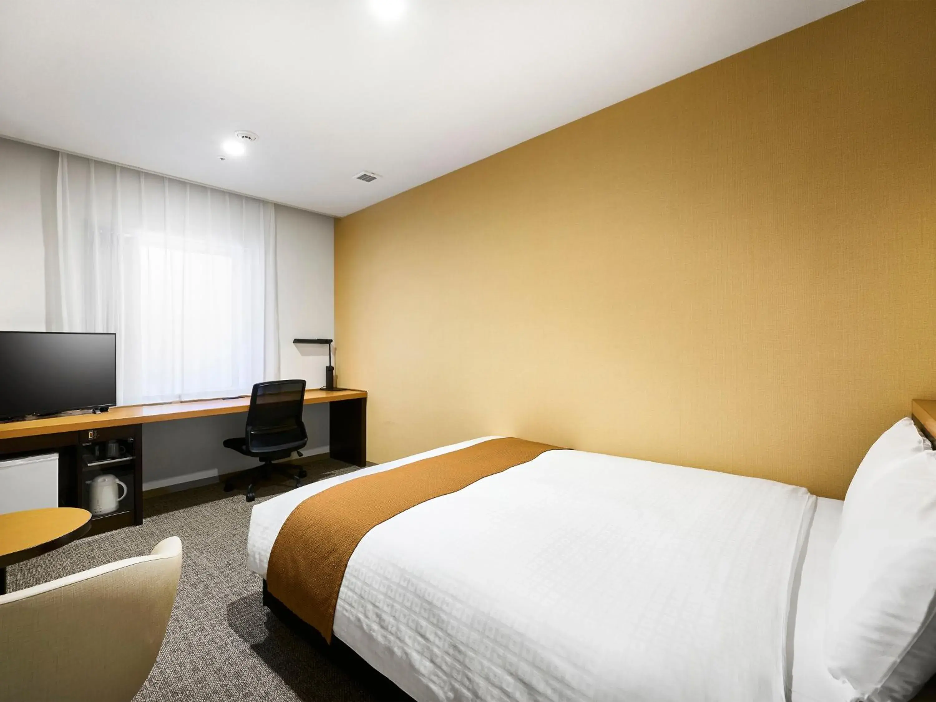 Bed in Daiwa Roynet Hotel Nagoya Shinkansenguchi Bed in Daiwa Roynet Hotel Nagoya Shinkansenguchi