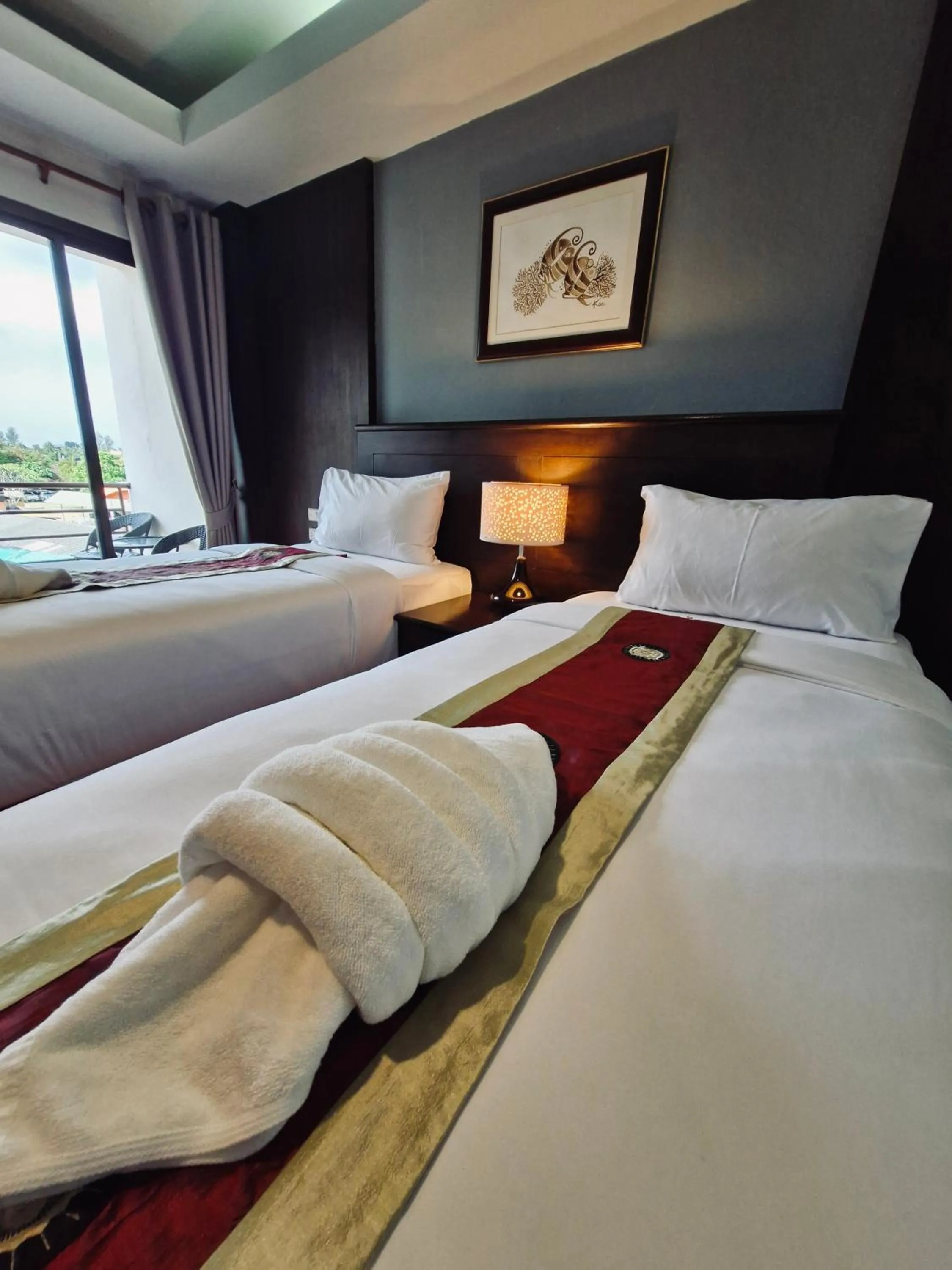 Bed in The Atnal Lanta Budget and Eco Friendly hotel in Koh Lanta