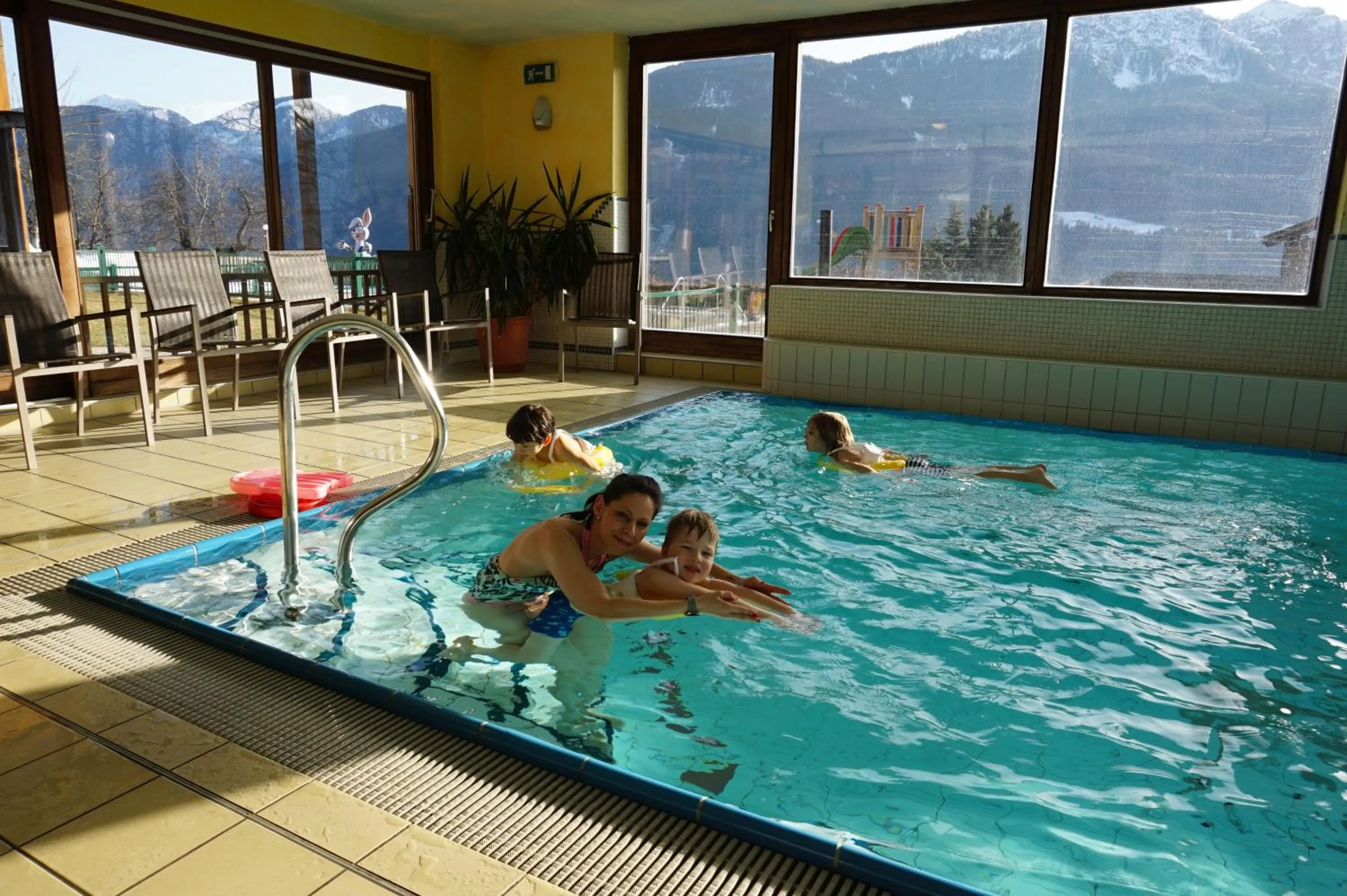 Swimming pool in nawu apartments & Restaurant