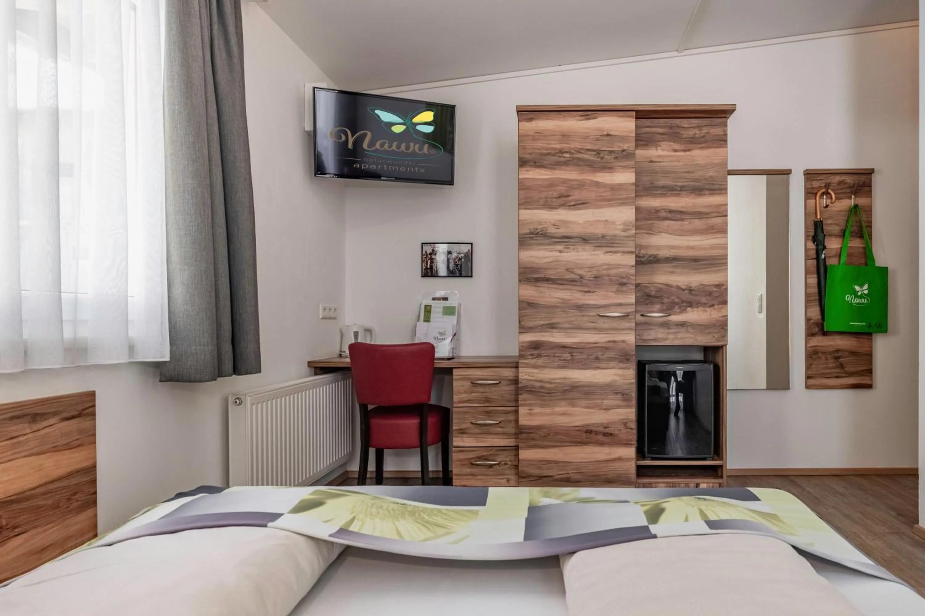 Photo of the whole room, Bed in nawu apartments & Restaurant