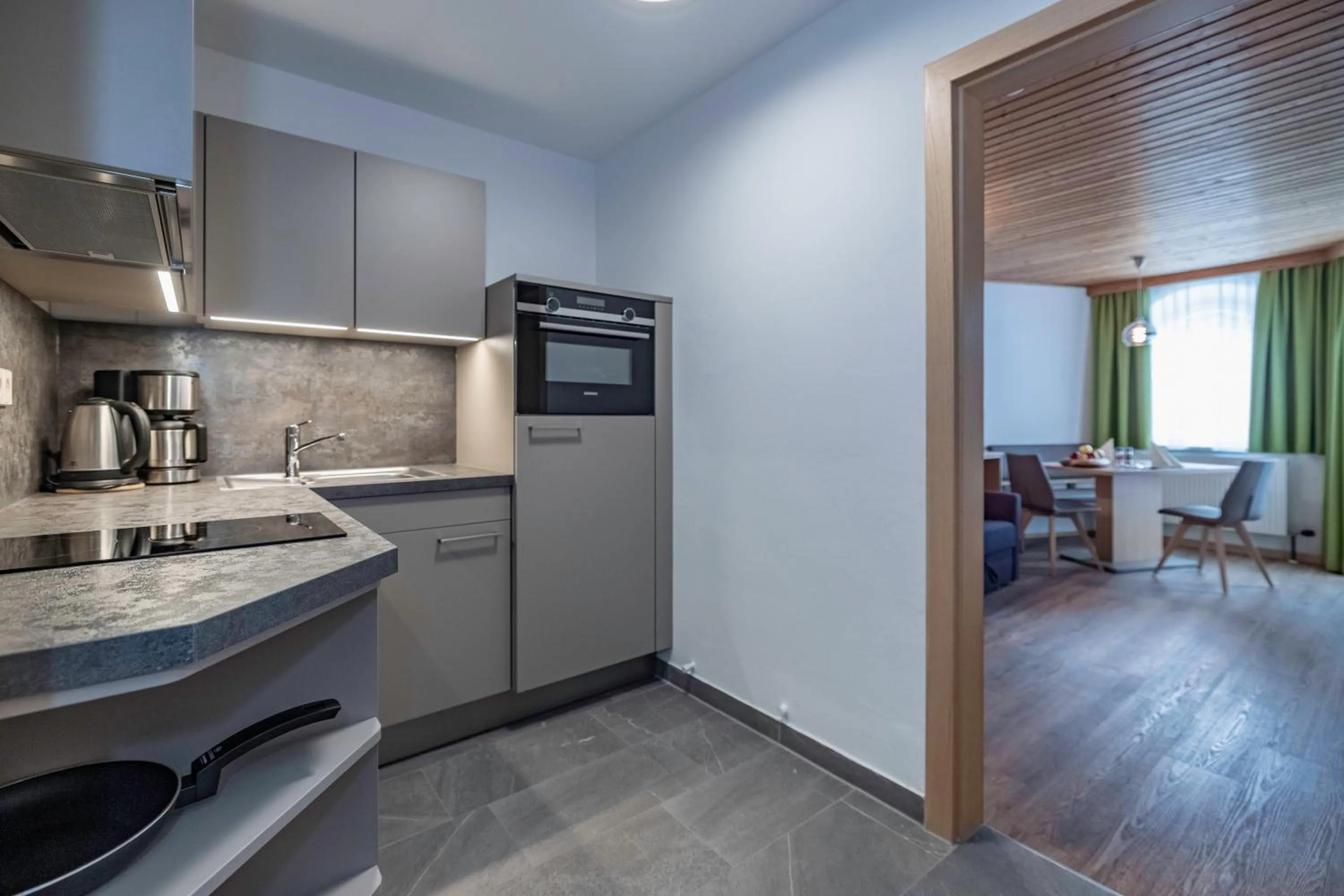 kitchen in nawu apartments & Restaurant