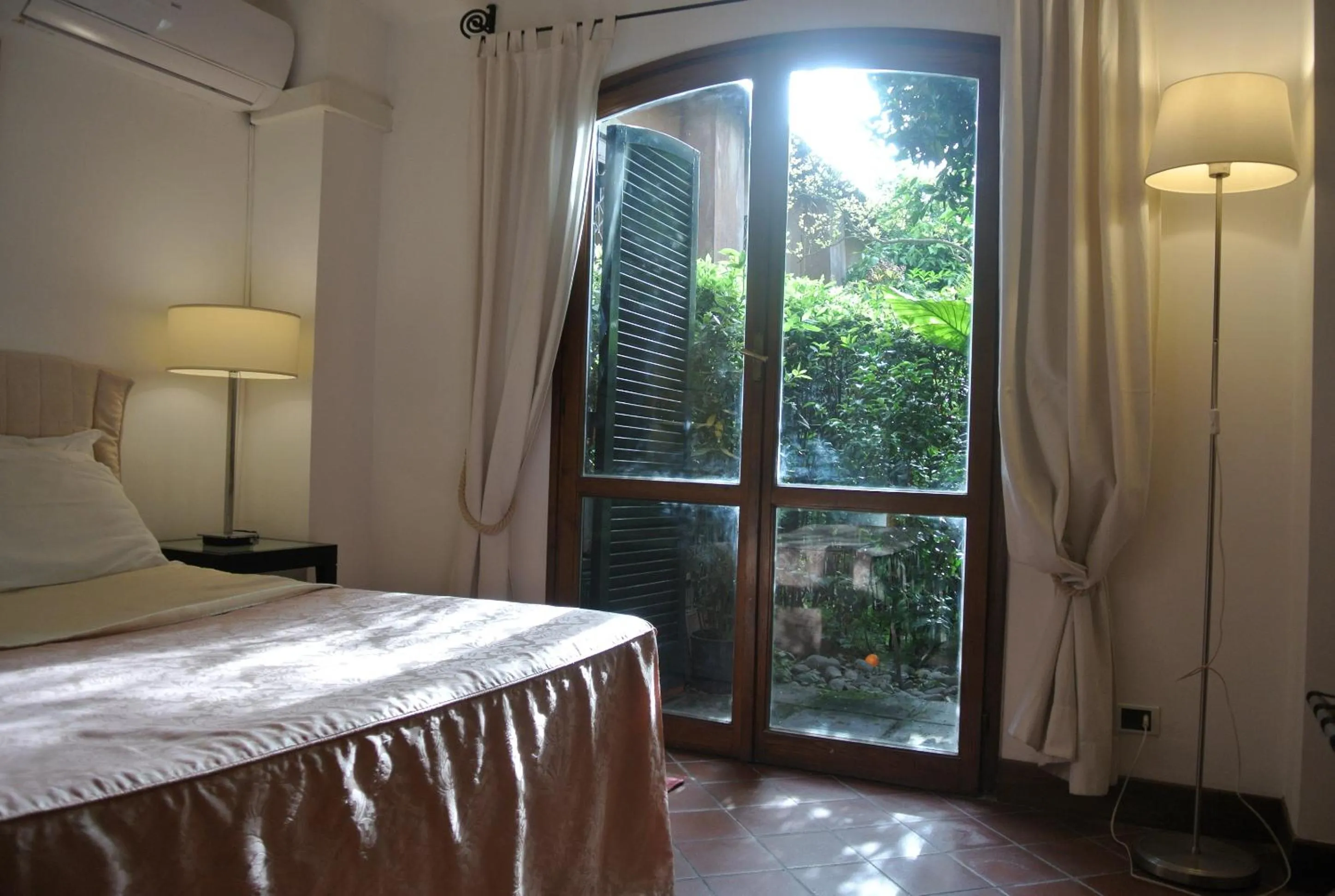 Bedroom, Bed in Appartamento Garden Palatino