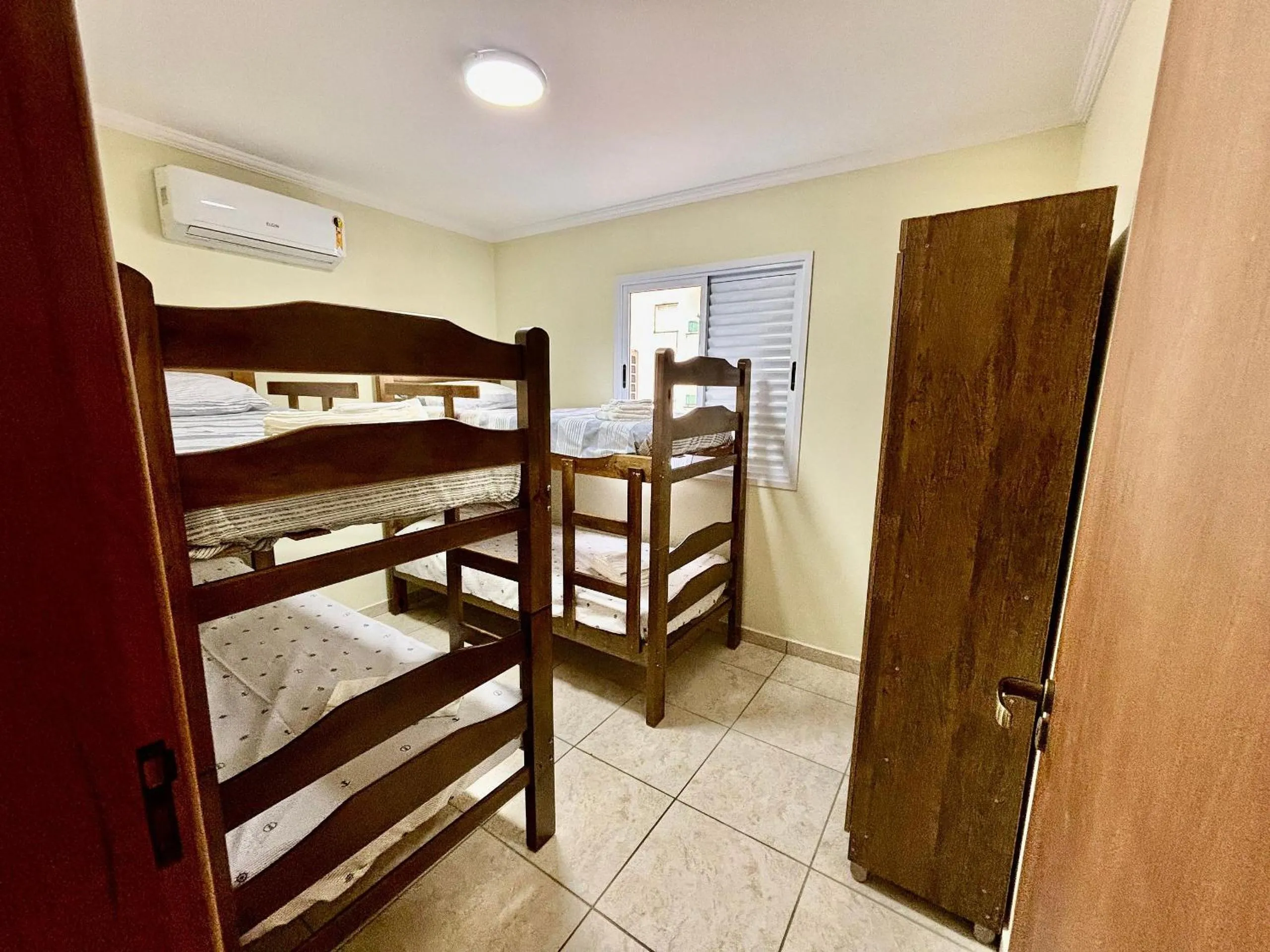 Bed in Lindo Apto em Ubatuba/SP - Toninhas c/Ar