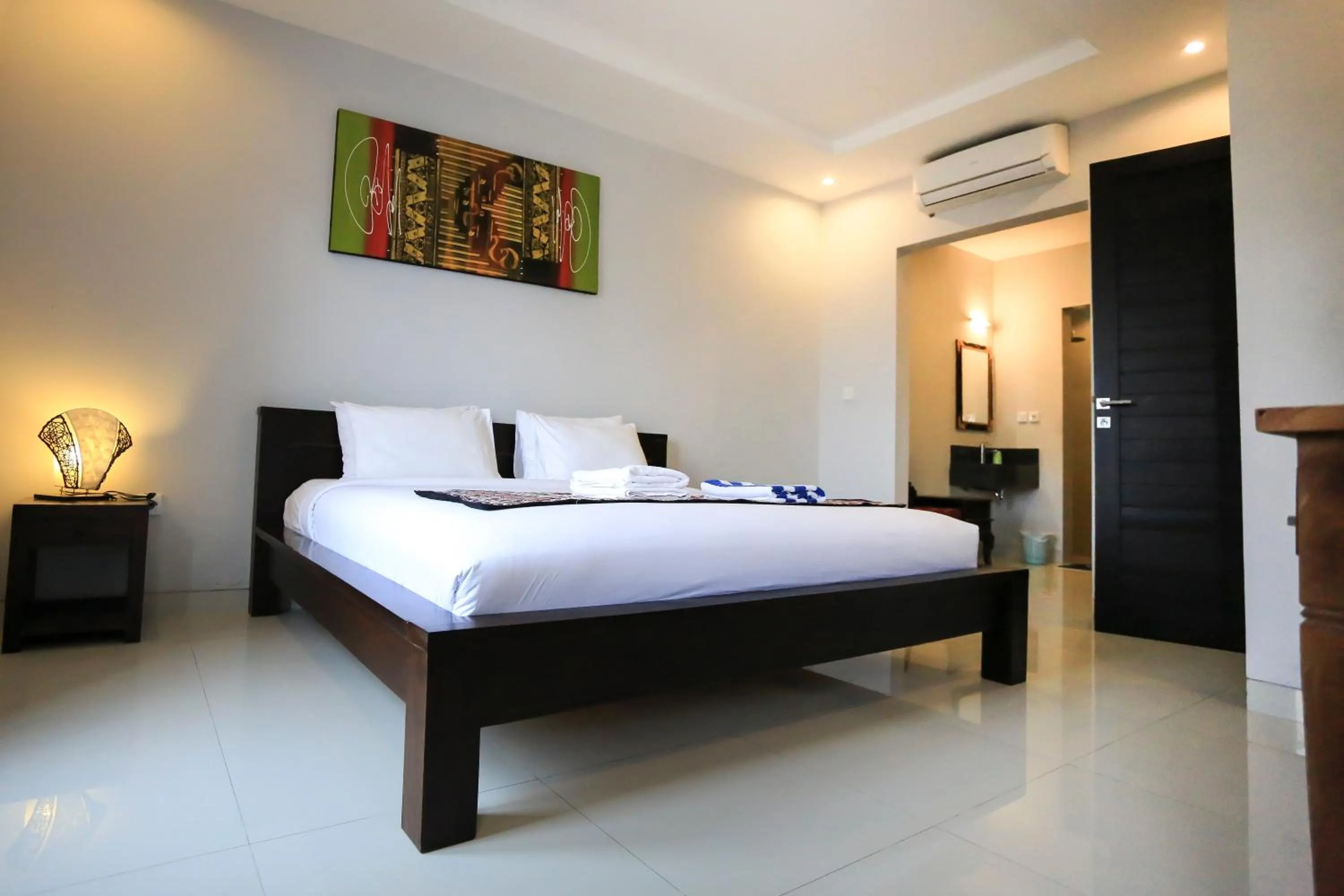 Bed in Nyoman Villa Sanur