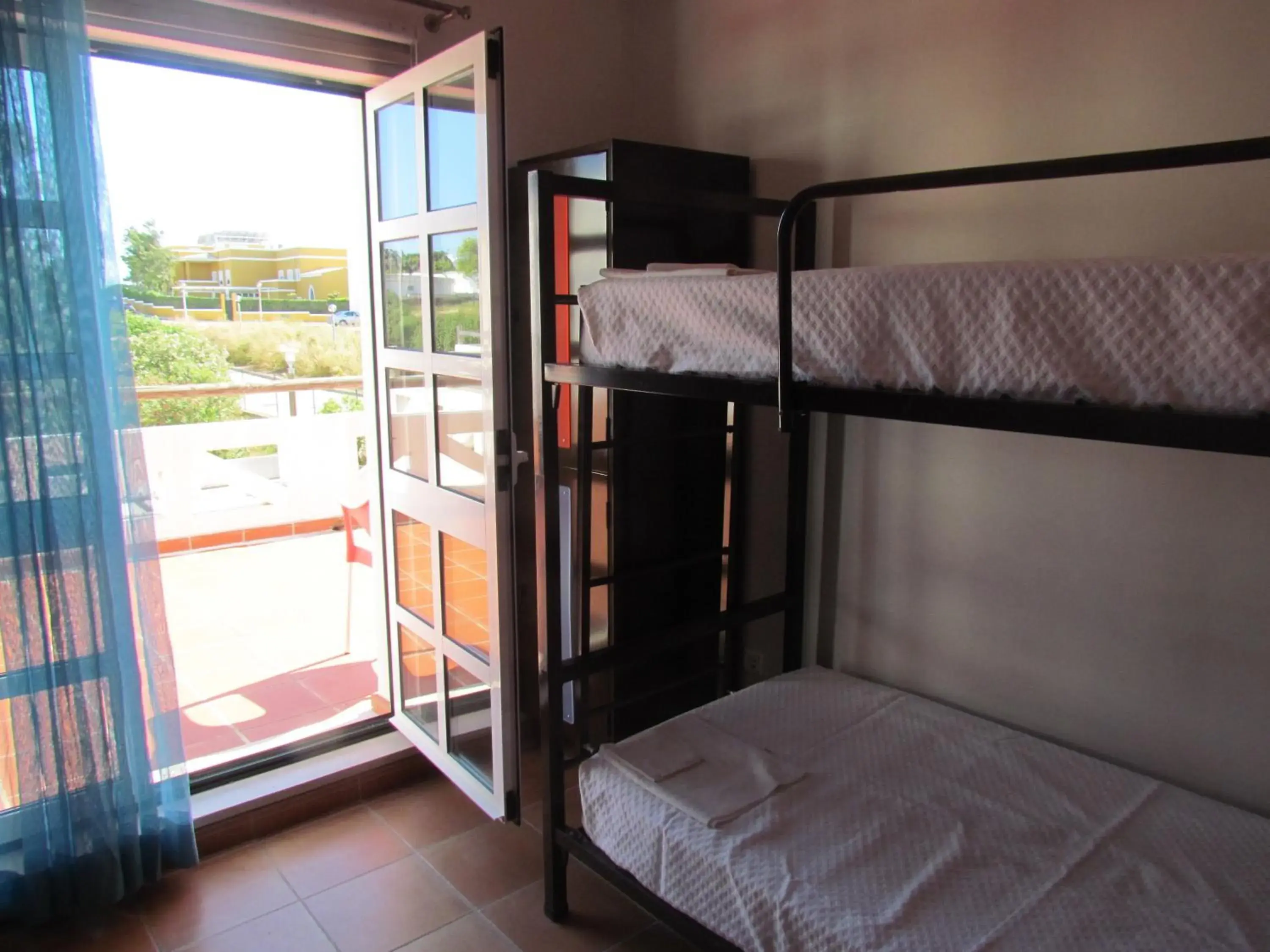 Bedroom, Bed in HI Portimão - Pousada de Juventude Bedroom, Bed in HI Portimão - Pousada de Juventude