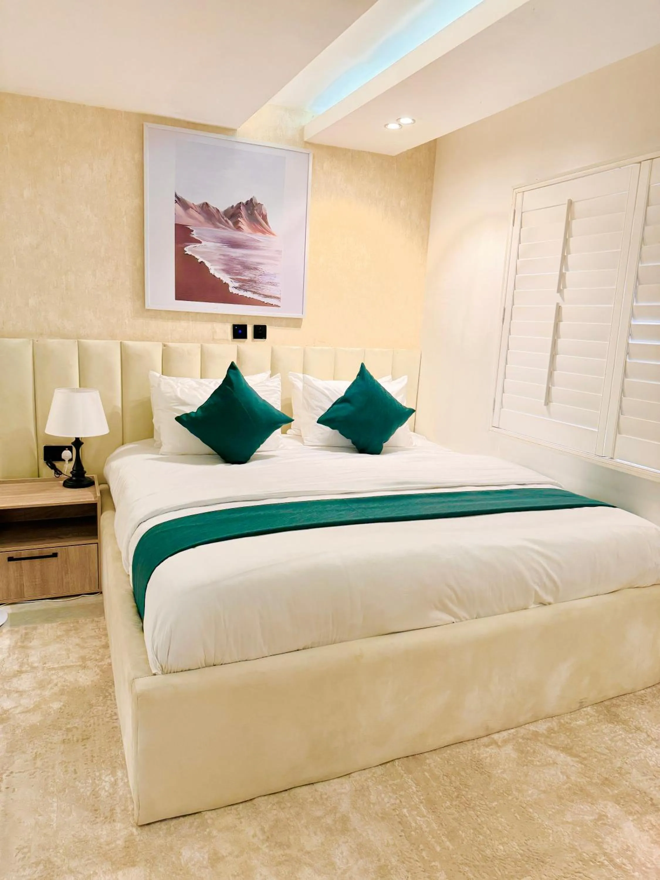 Bed in Tranquil Oasis Hotel