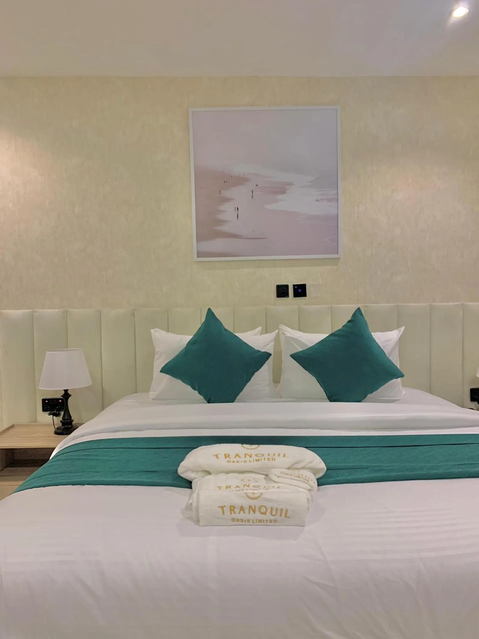 Bed in Tranquil Oasis Hotel