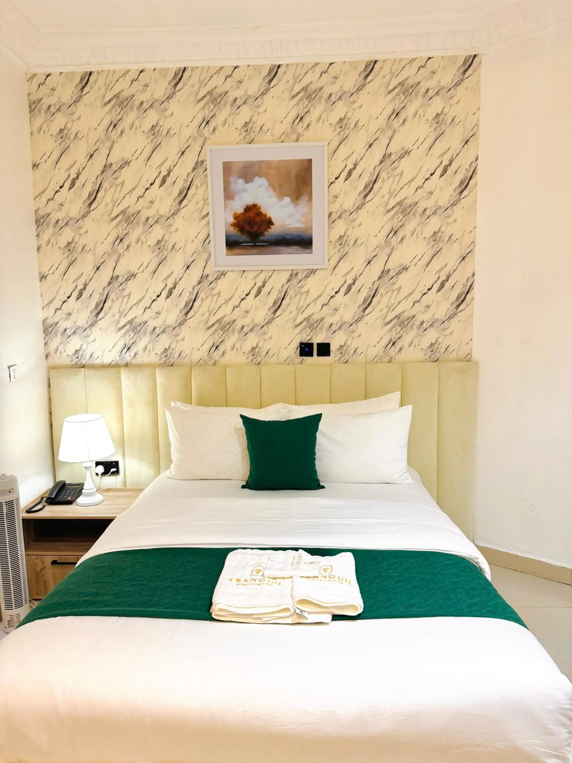 Bed in Tranquil Oasis Hotel