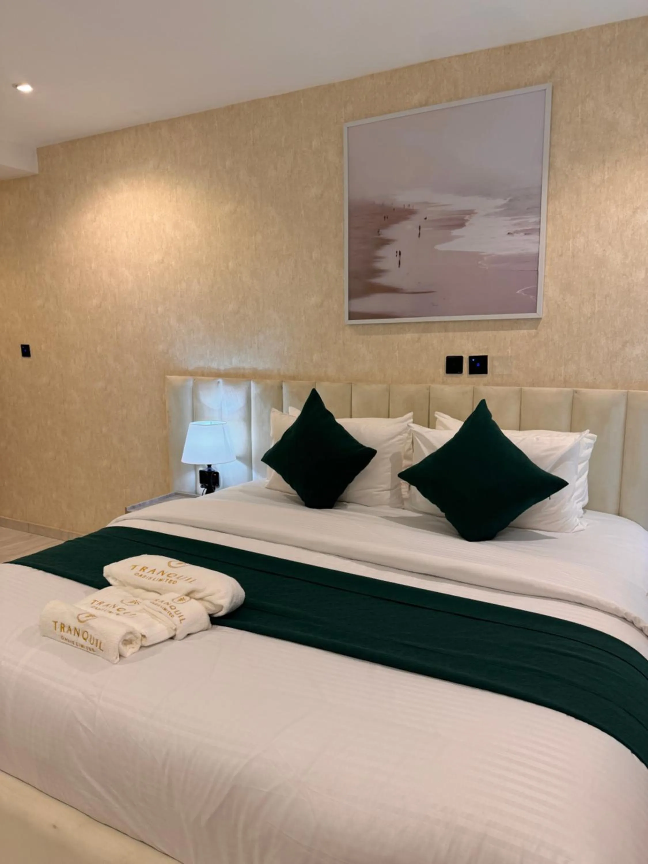 Bed in Tranquil Oasis Hotel