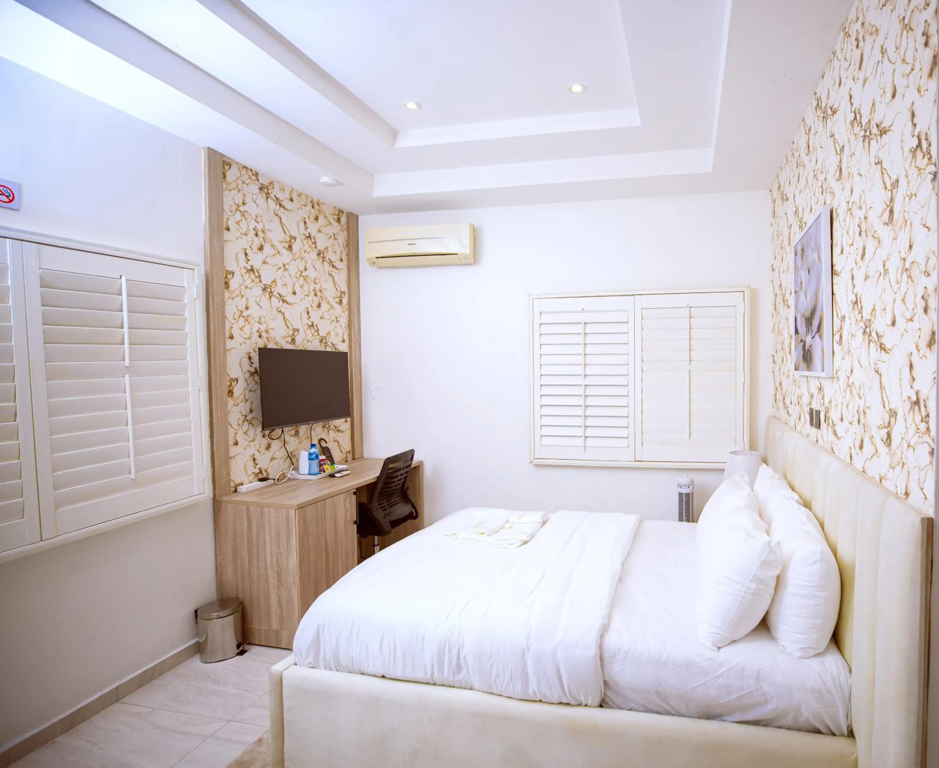 Bed in Tranquil Oasis Hotel