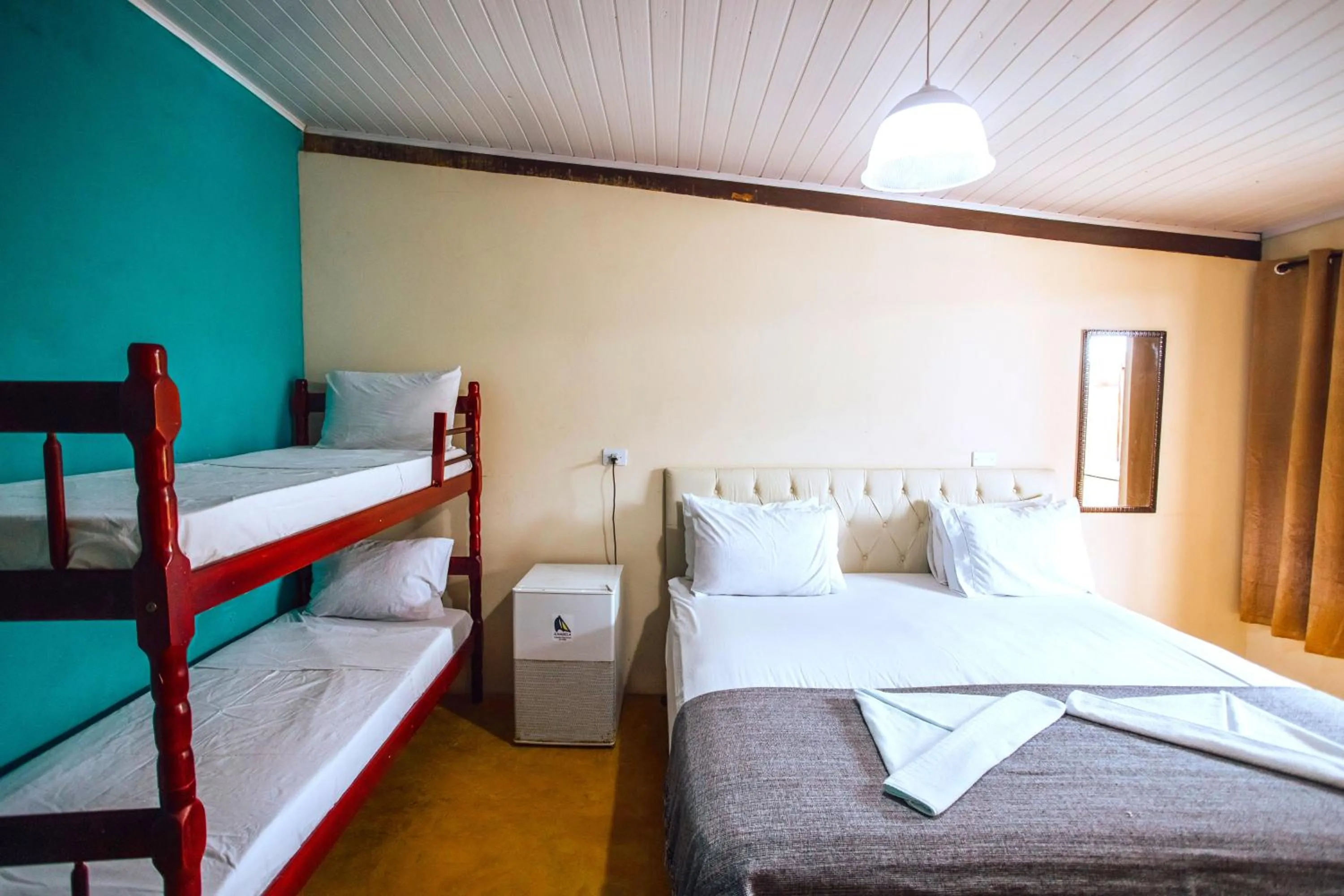 Bed in VELINN Pousada Praia do Perequê