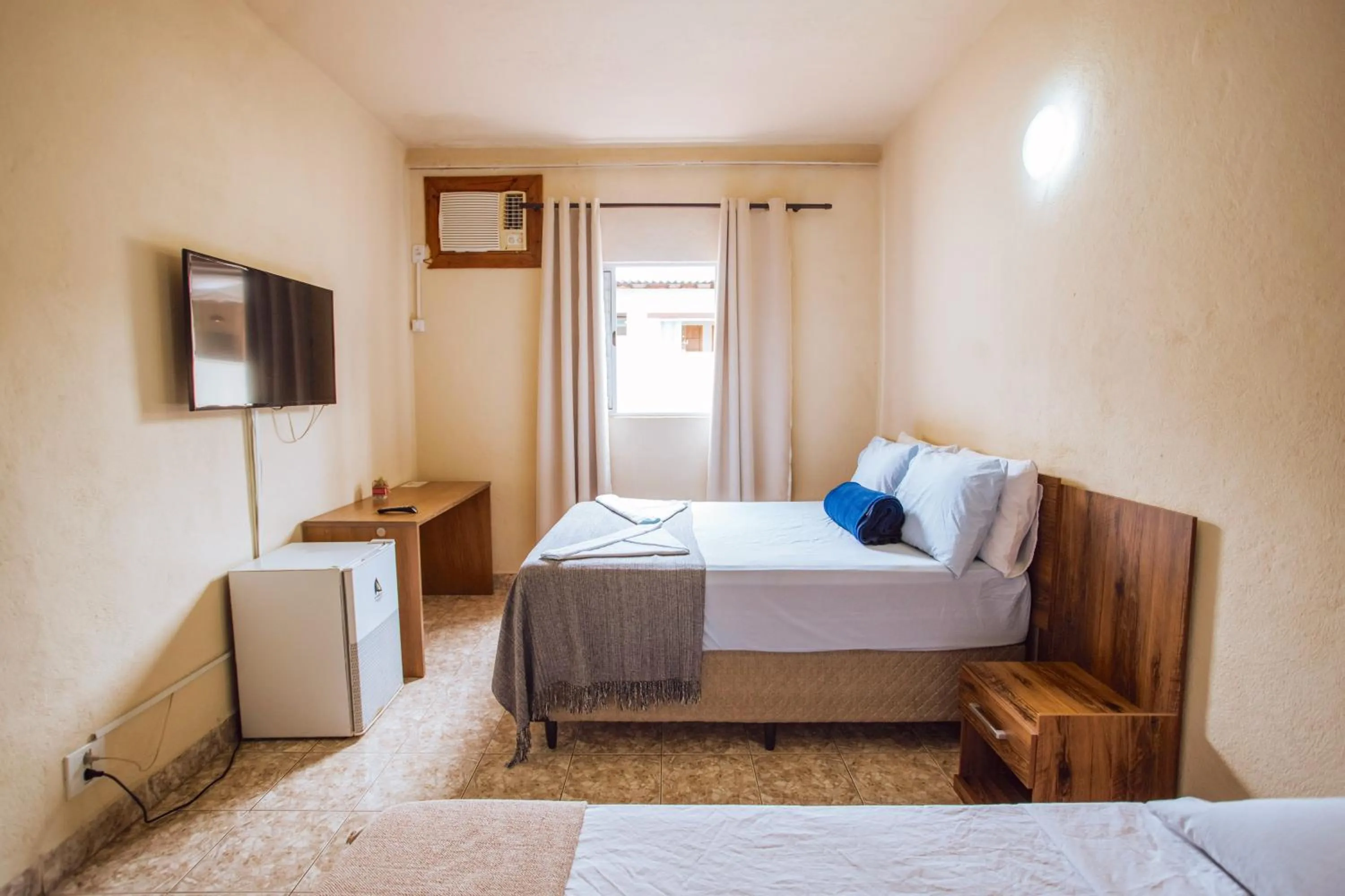 Bed in VELINN Pousada Praia do Perequê