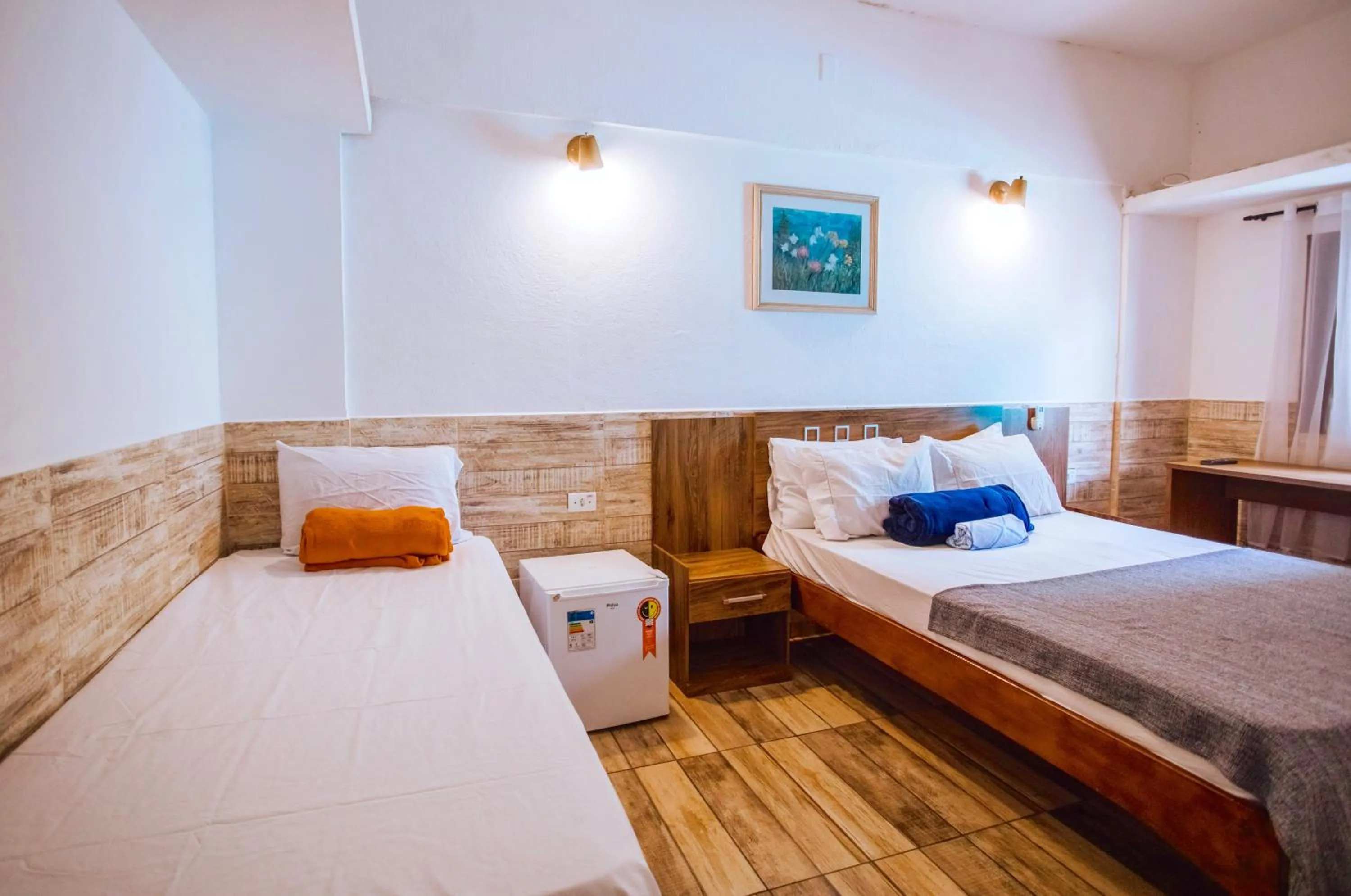 Bed in VELINN Pousada Praia do Perequê