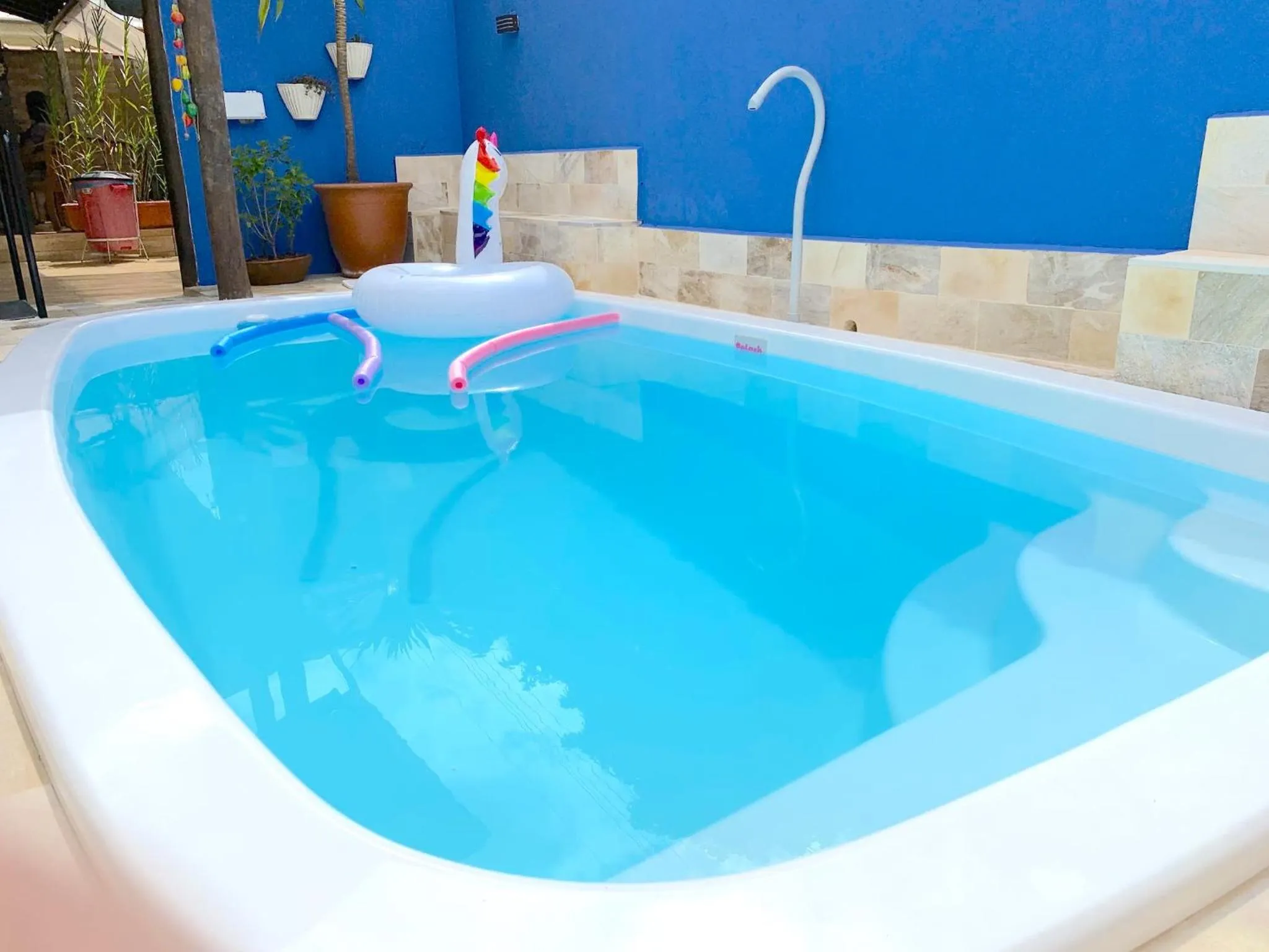 Swimming pool in VELINN Pousada Praia do Perequê