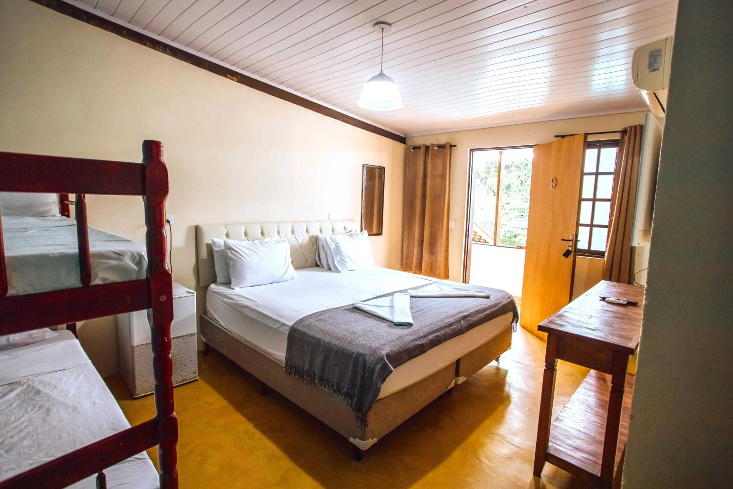 Bed in VELINN Pousada Praia do Perequê