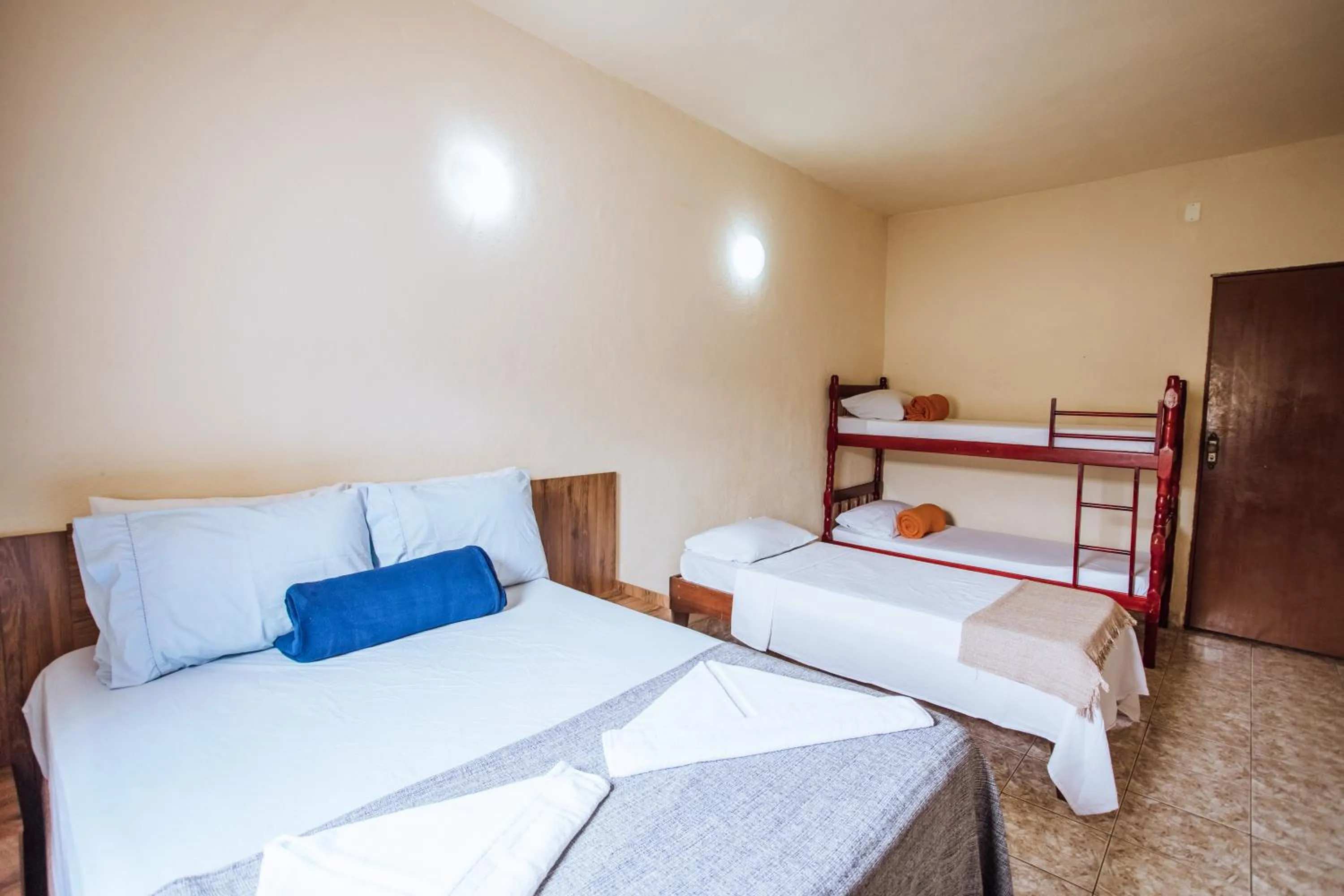 Bed in VELINN Pousada Praia do Perequê