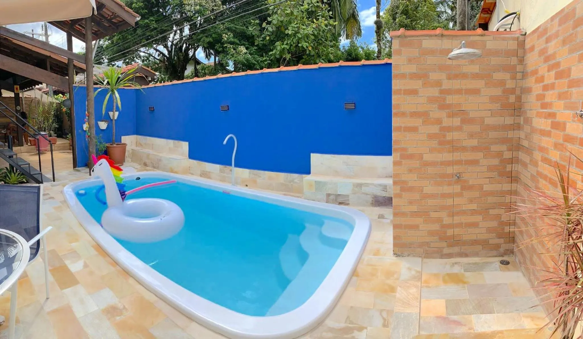 Swimming pool in VELINN Pousada Praia do Perequê