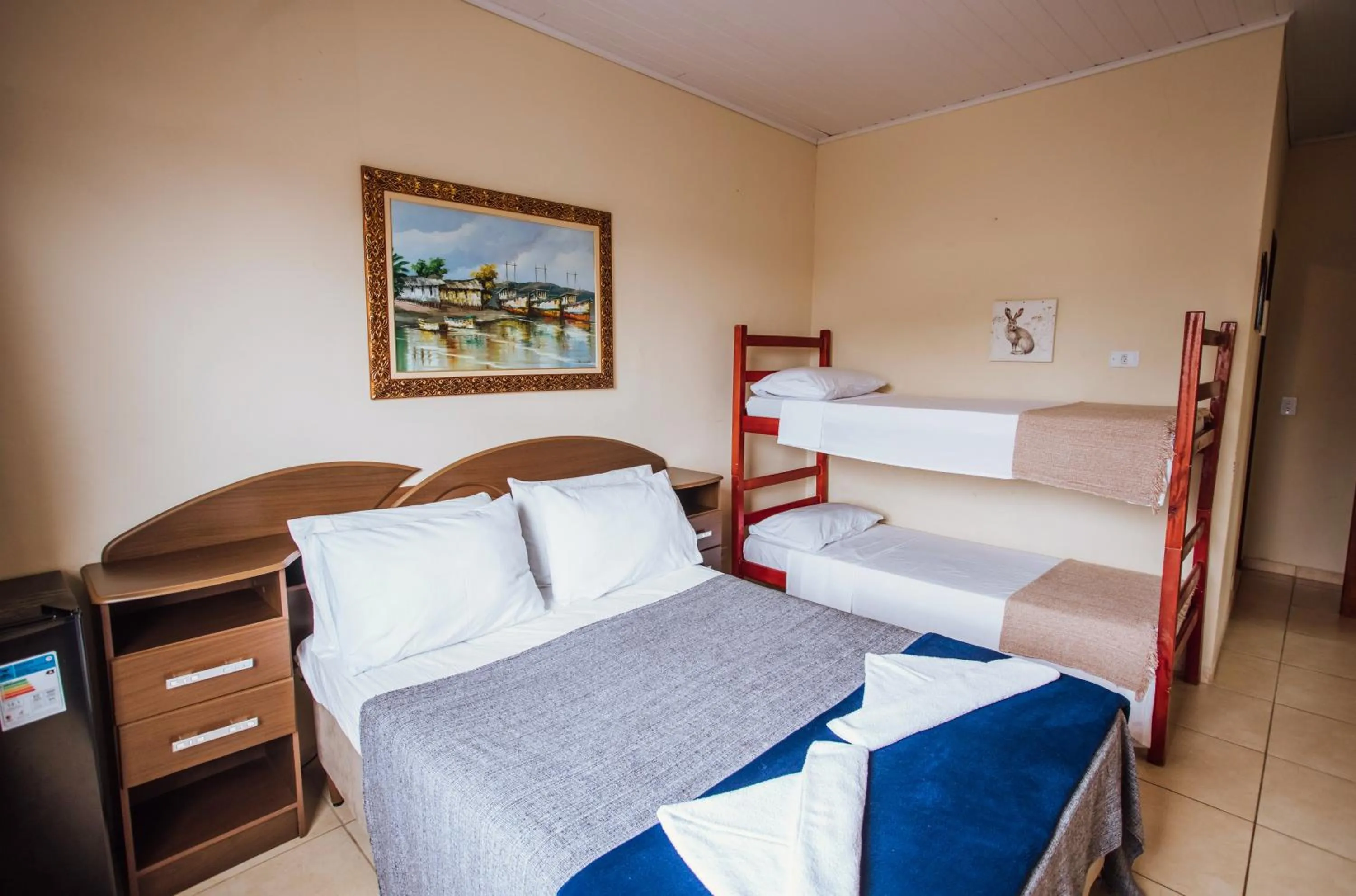 Bed in VELINN Pousada Praia do Perequê