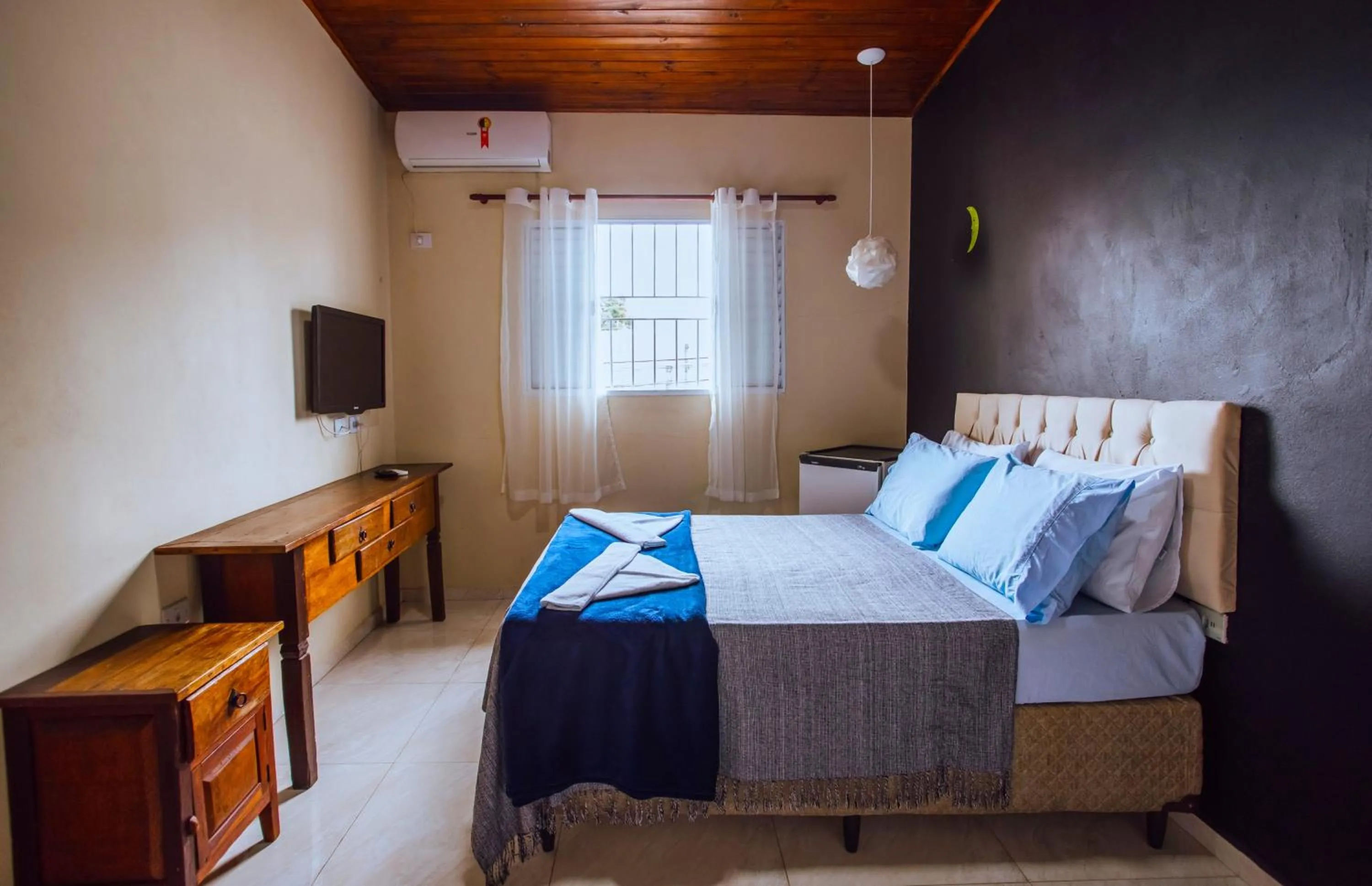 Bed in VELINN Pousada Praia do Perequê