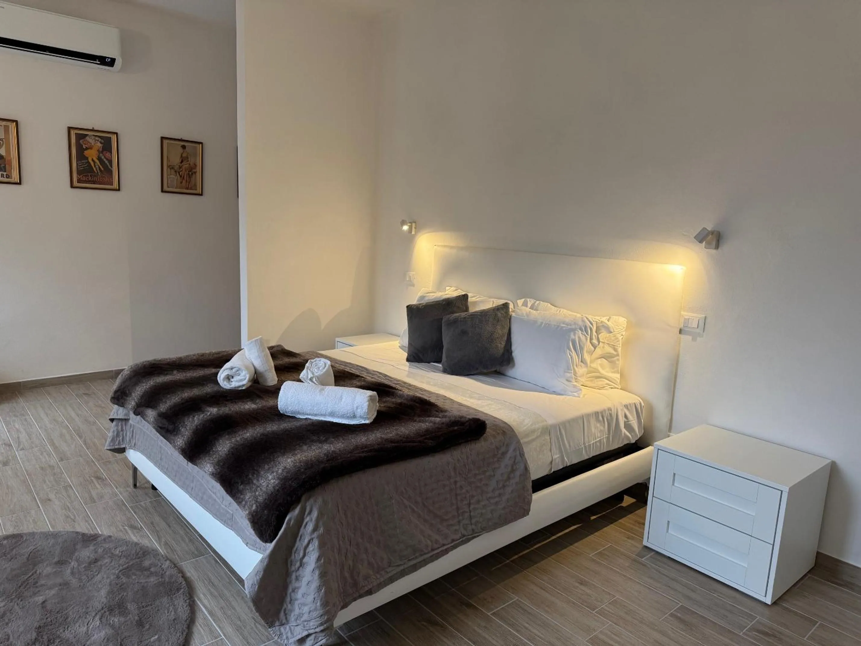 Bed in Albergo Tenco by Bottega