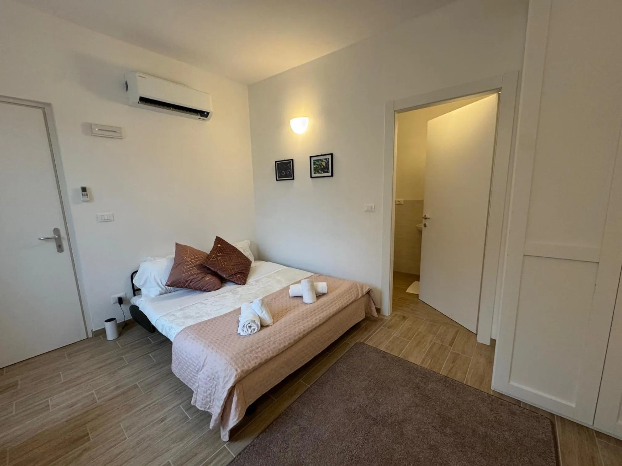 Bed in Albergo Tenco by Bottega