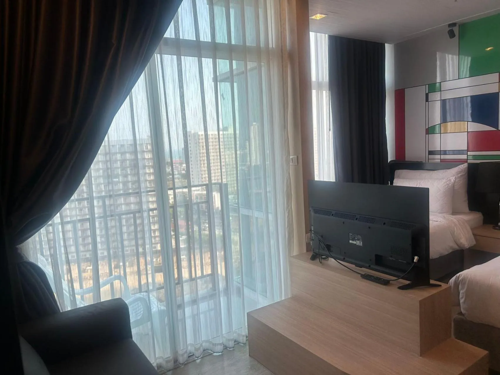 Living room, Bed in The Grand Jomtien Condo