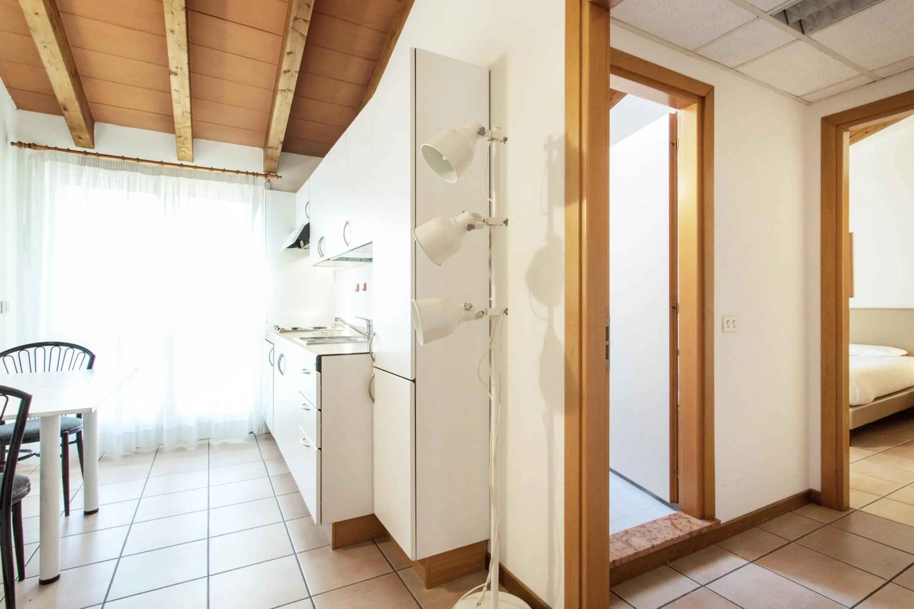 Kitchen or kitchenette, Bed in Residenza Le Cupole