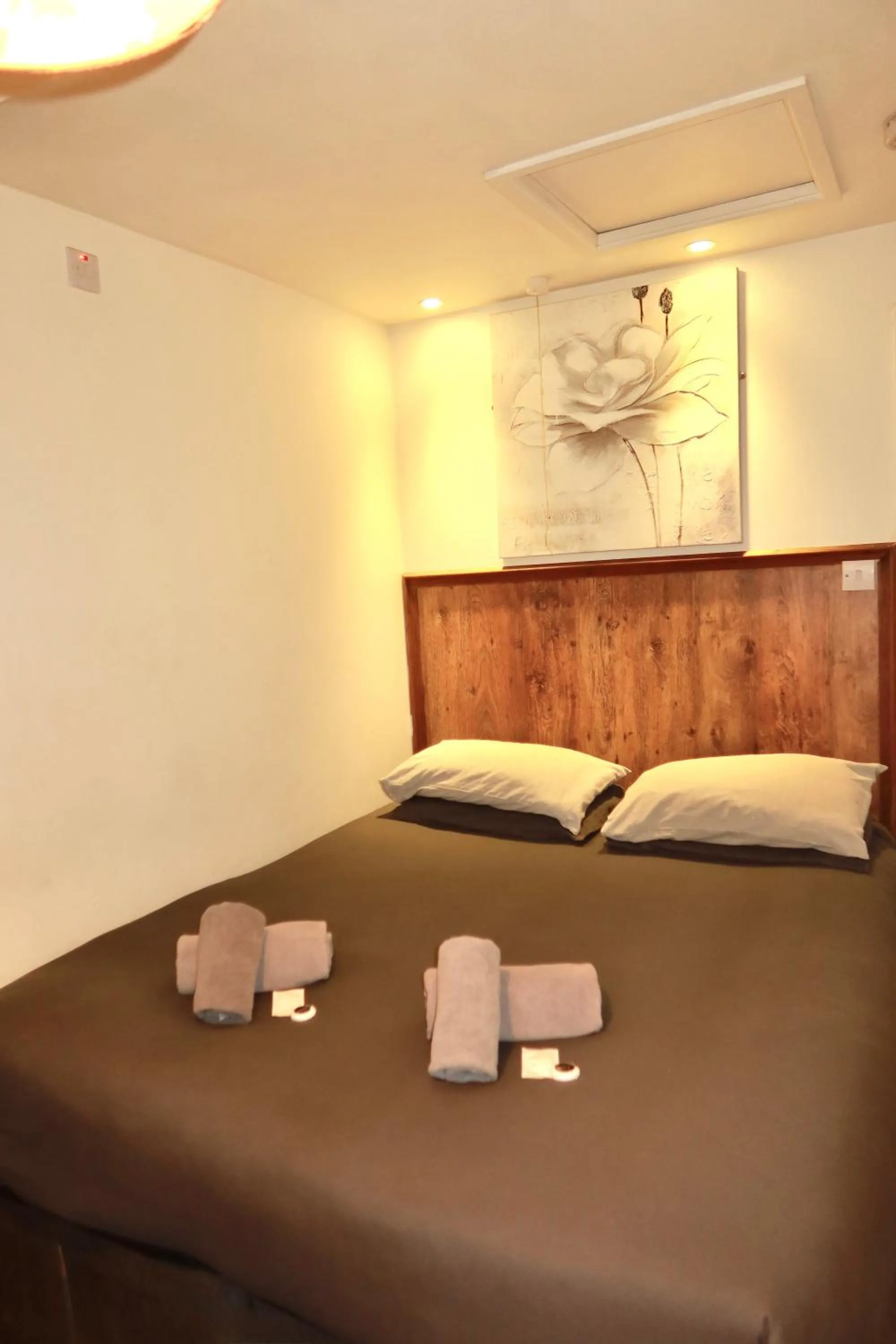 Bed in Riverside Hotel