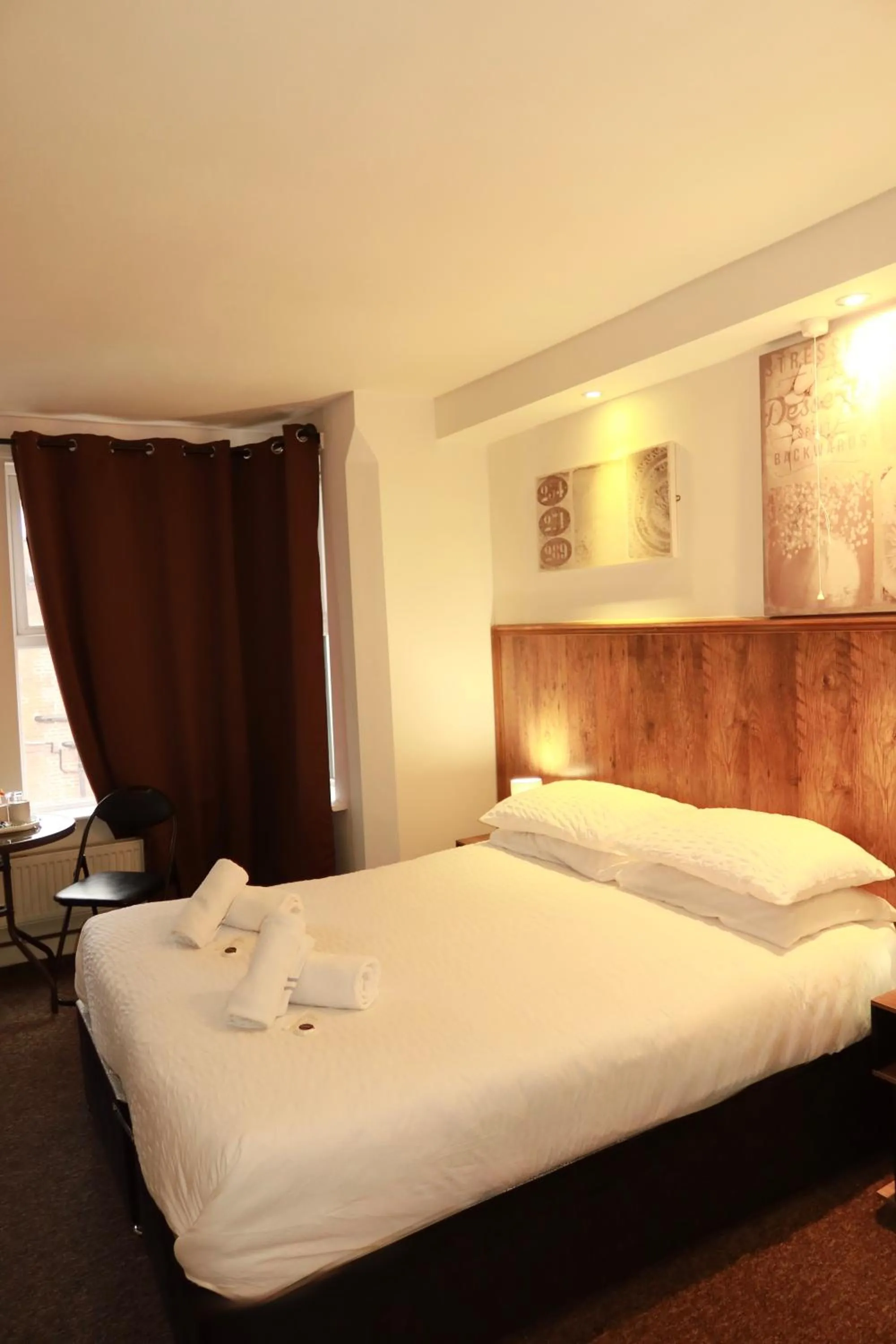 Bed in Riverside Hotel