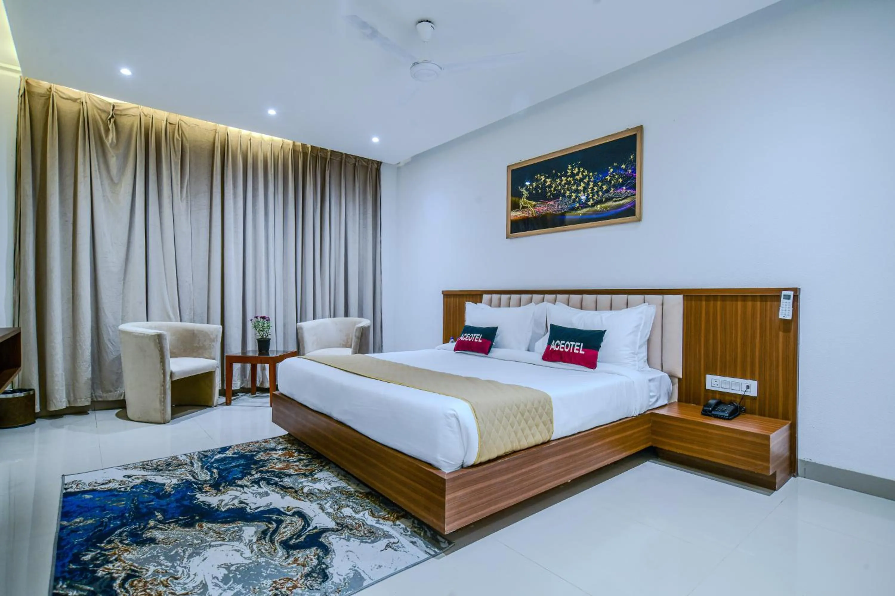 Bed in Aceotel Premier, Vijay Nagar