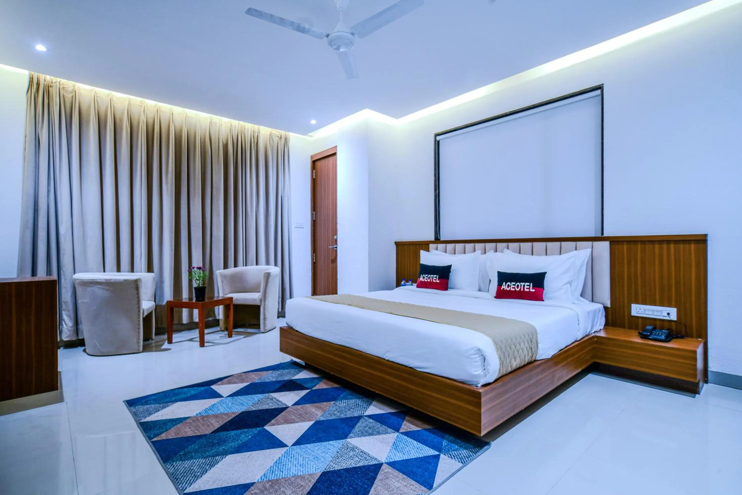 Bed in Aceotel Premier, Vijay Nagar