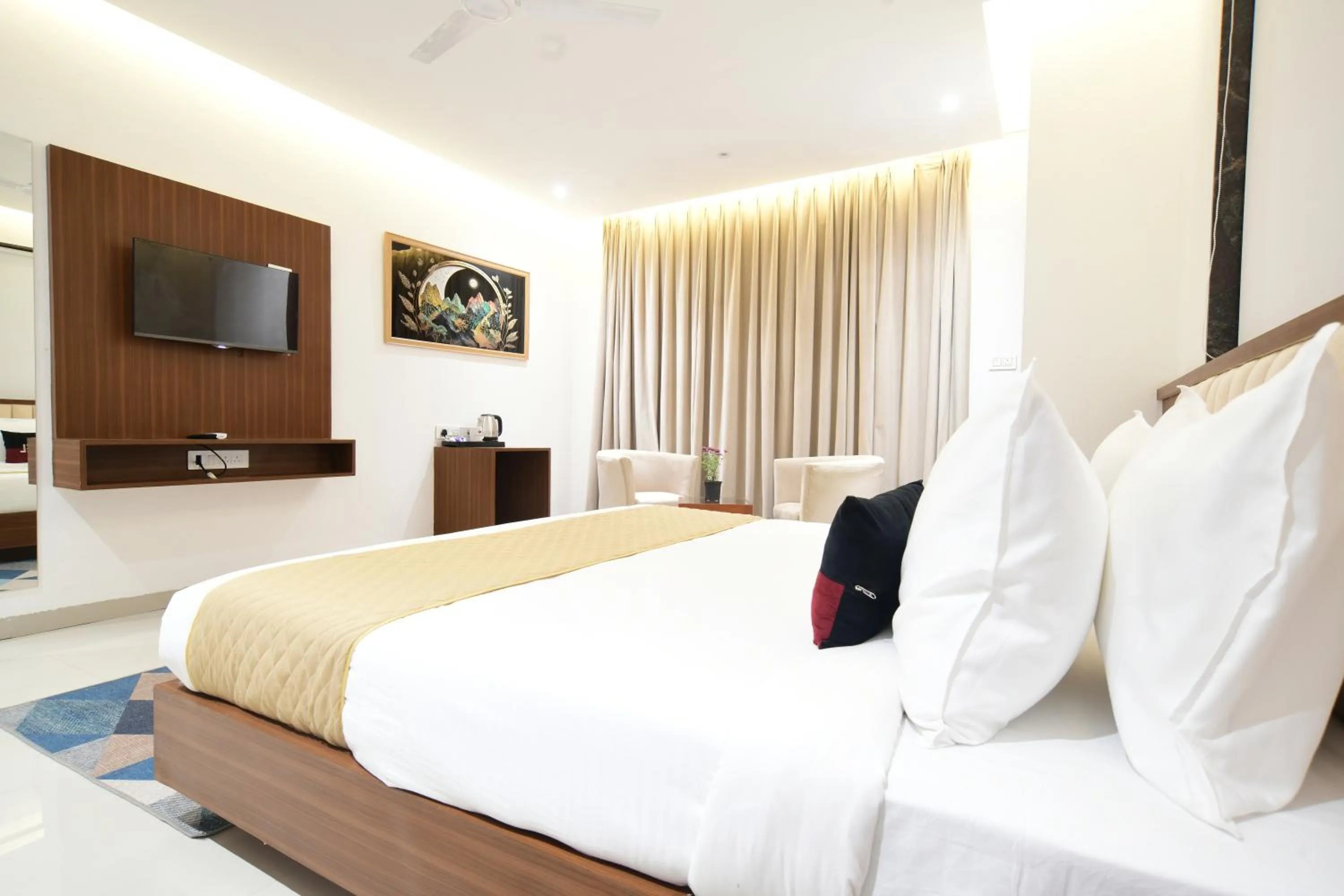 Communal lounge/ TV room, Bed in Aceotel Premier, Vijay Nagar