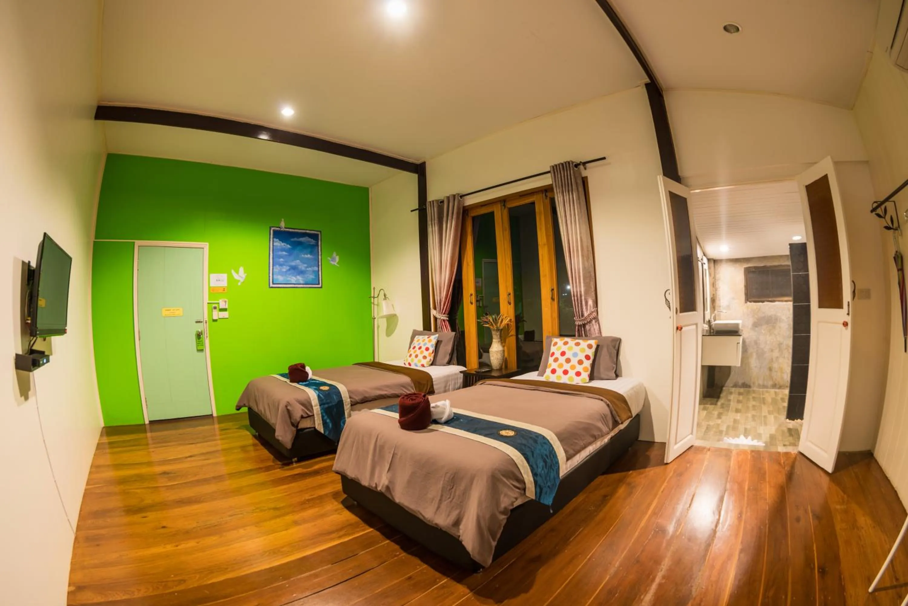 Bed in Aen Guy Boutique Hotel