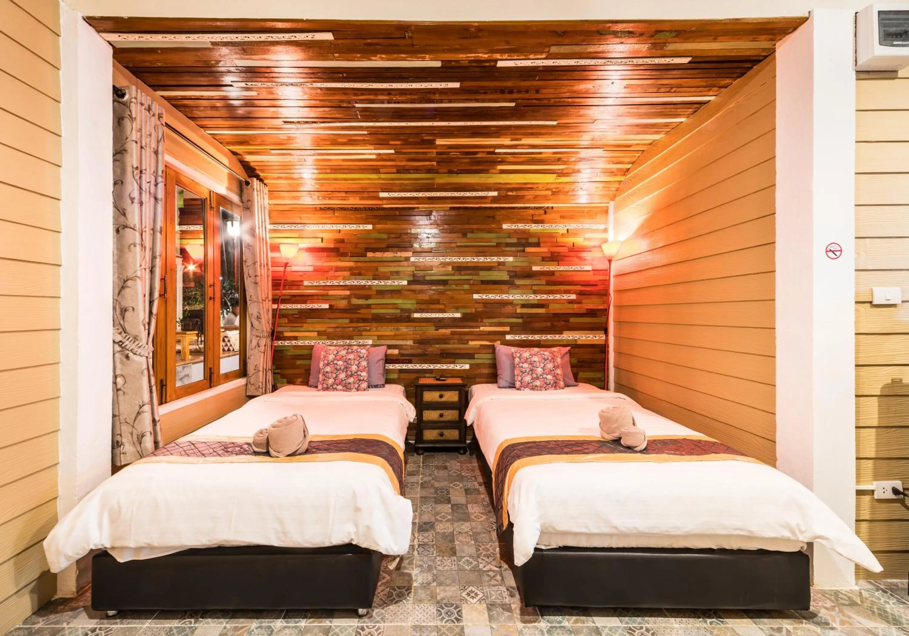 Bed in Aen Guy Boutique Hotel