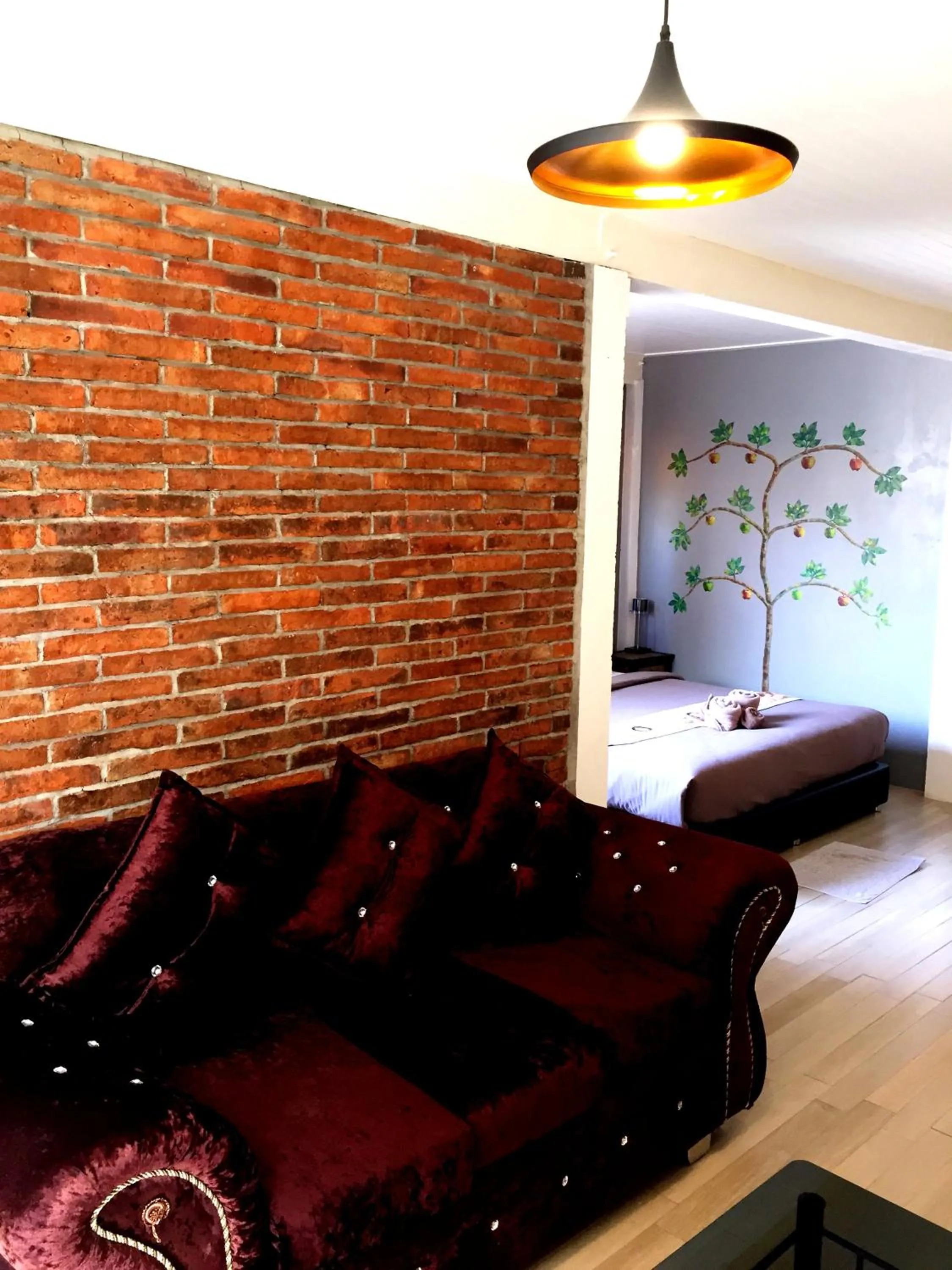 Bed in Aen Guy Boutique Hotel