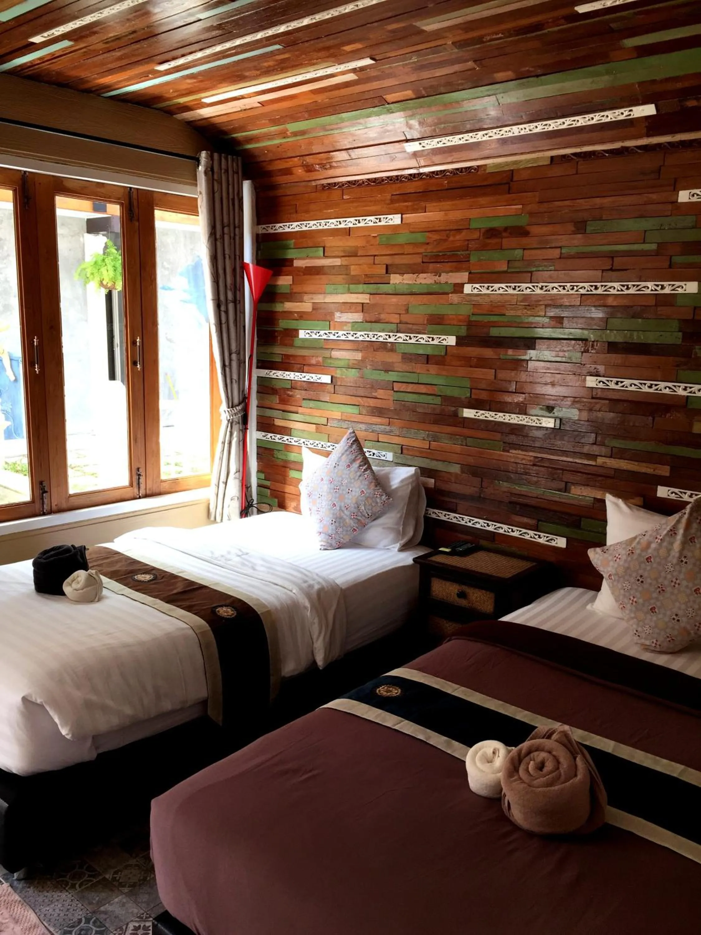 Bed in Aen Guy Boutique Hotel