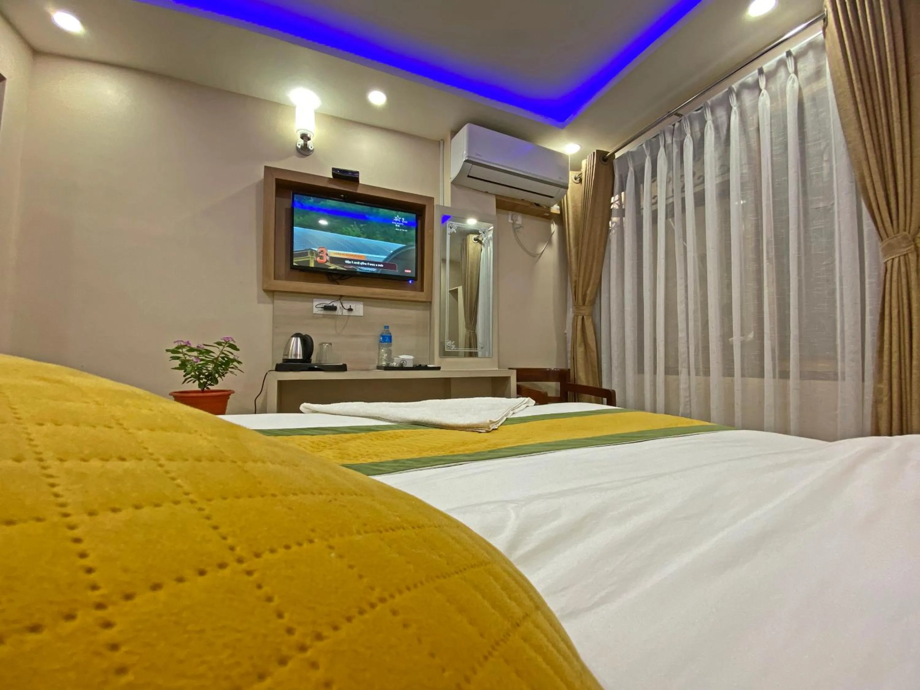 Bed in Hotel Aaradhya