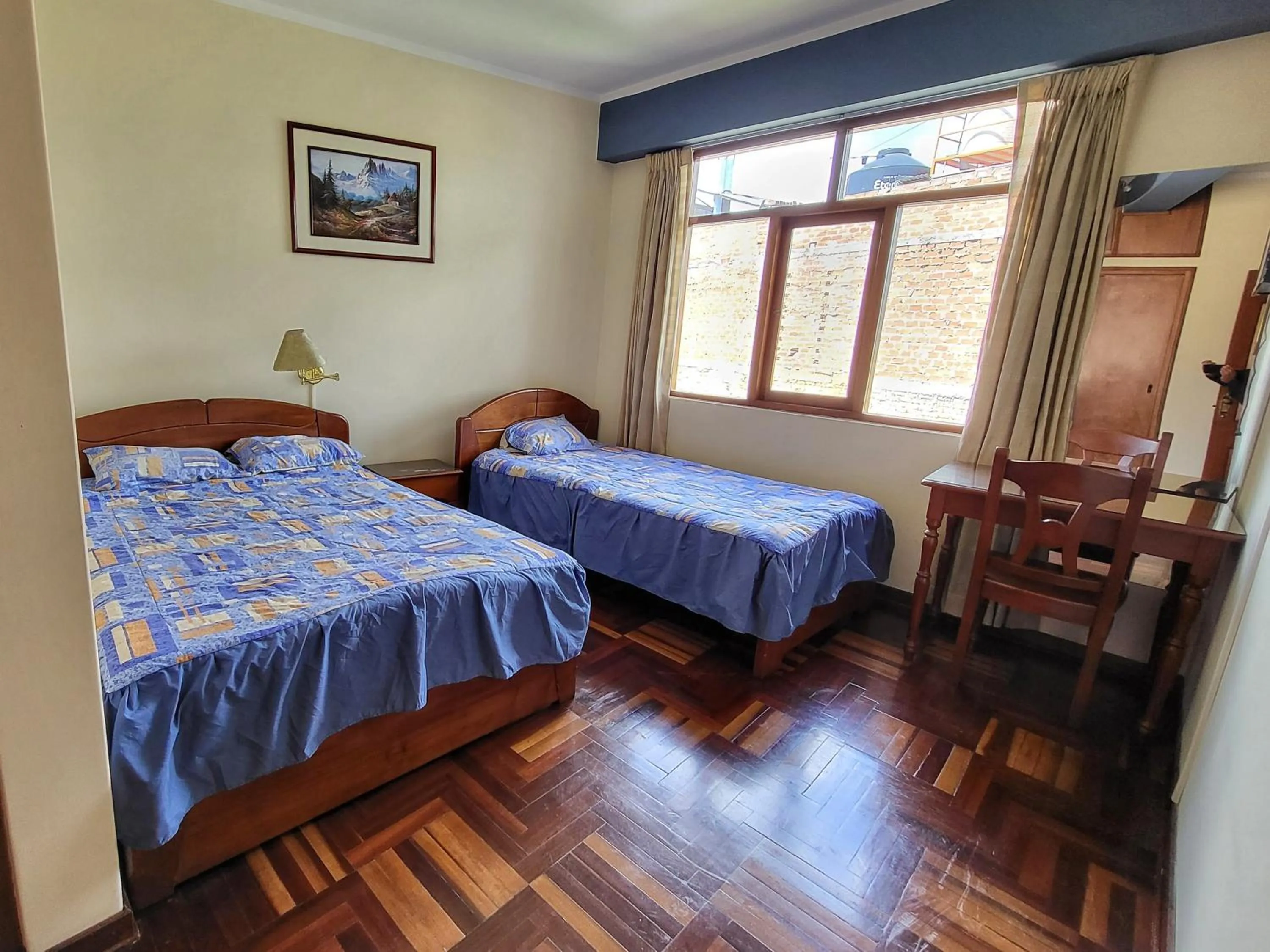 Bed in D'Cardenas Hotel