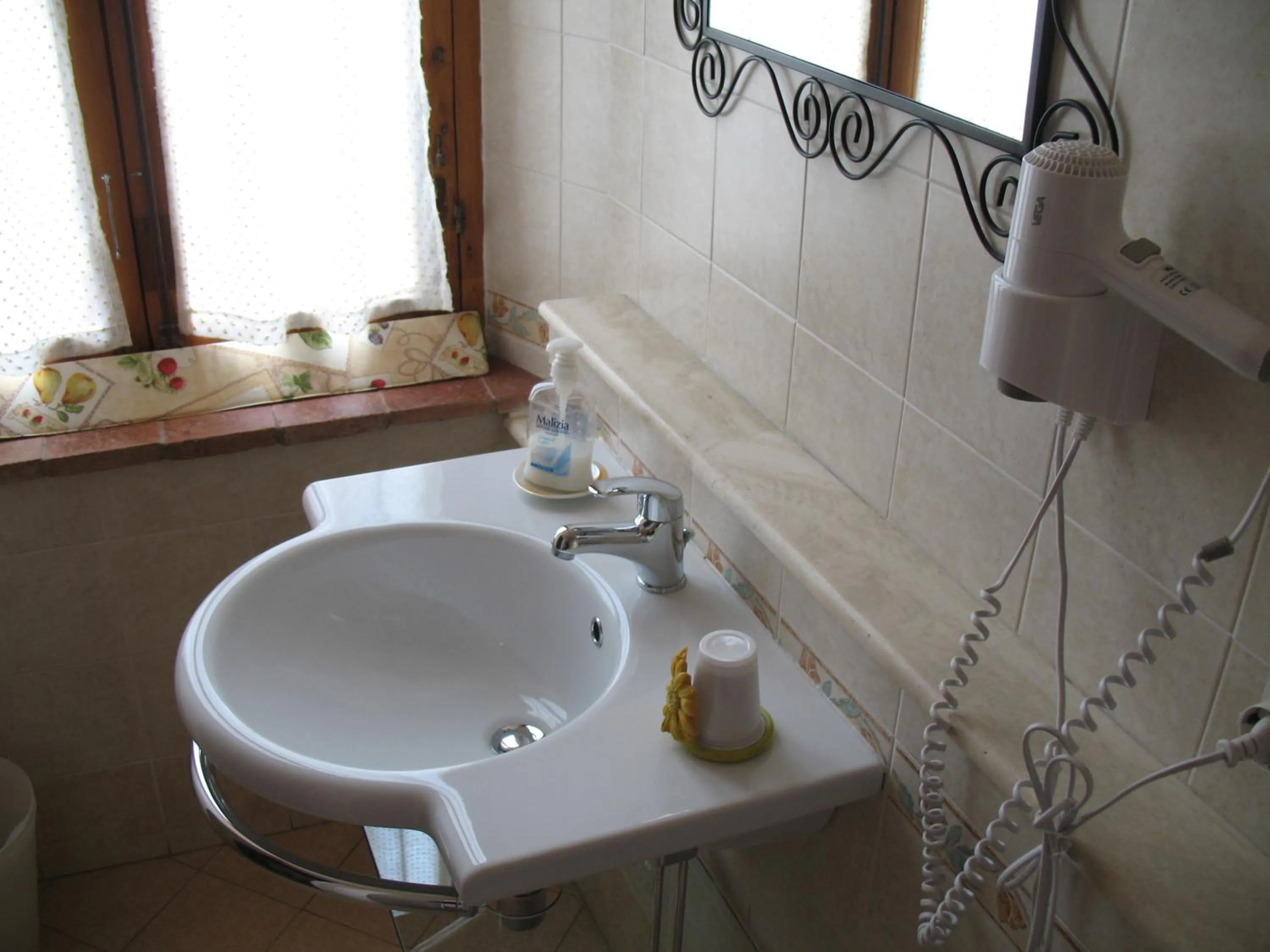 Bathroom in Locazione Turistica Totti
