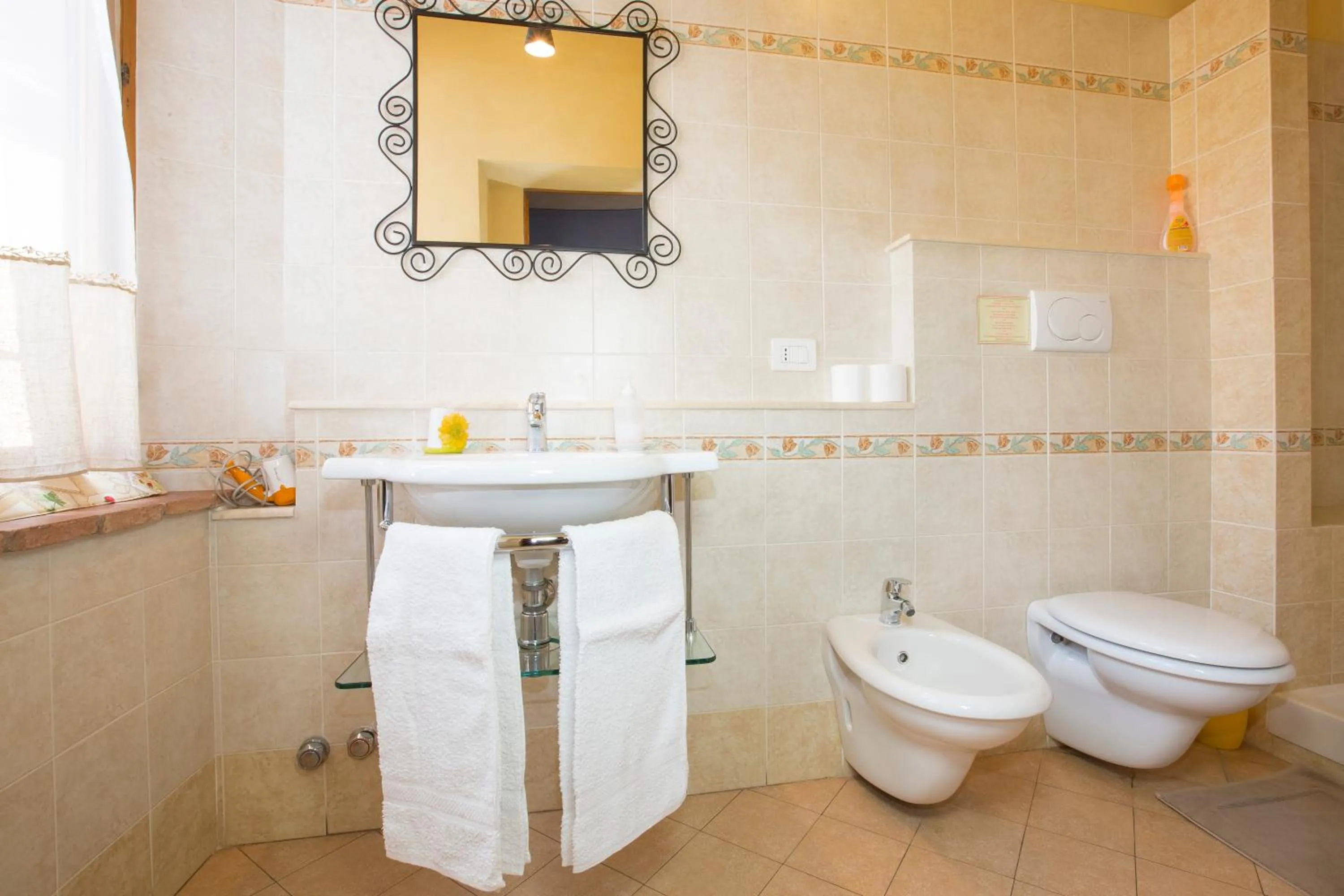 Bathroom in Locazione Turistica Totti