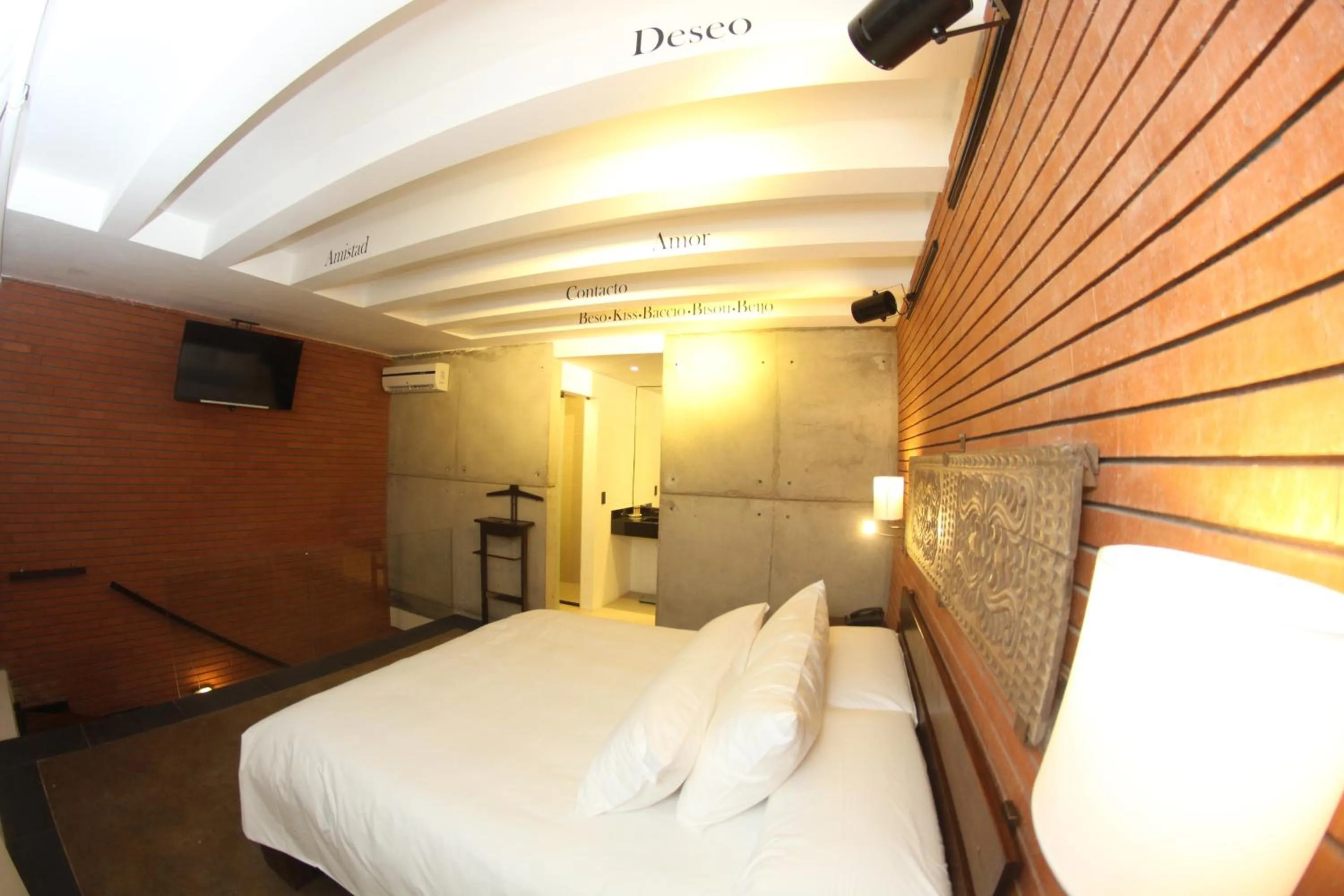 Bed in Alfonsina Hotel Boutique