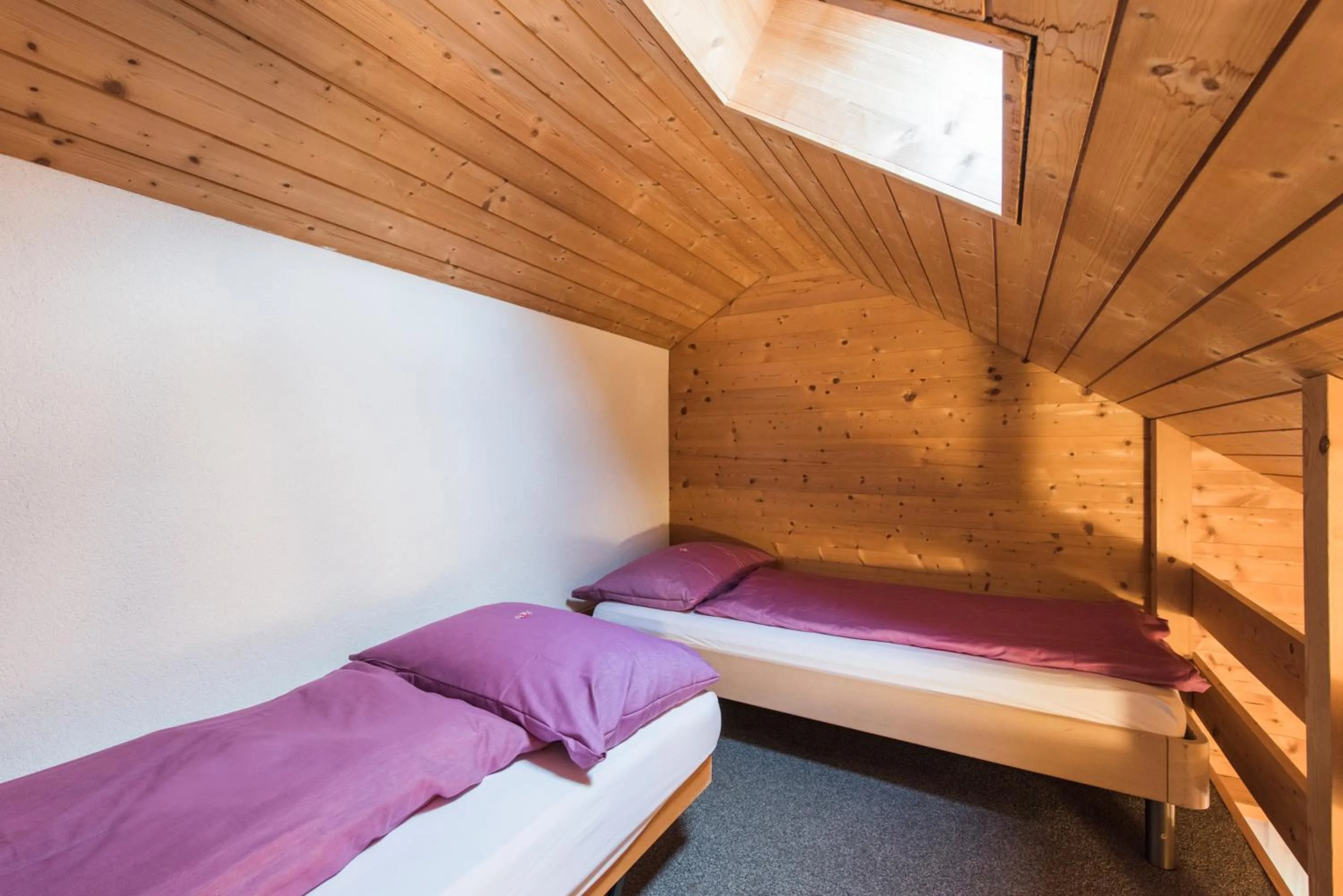 Bed in Hotel Alpenrose beim Ballenberg