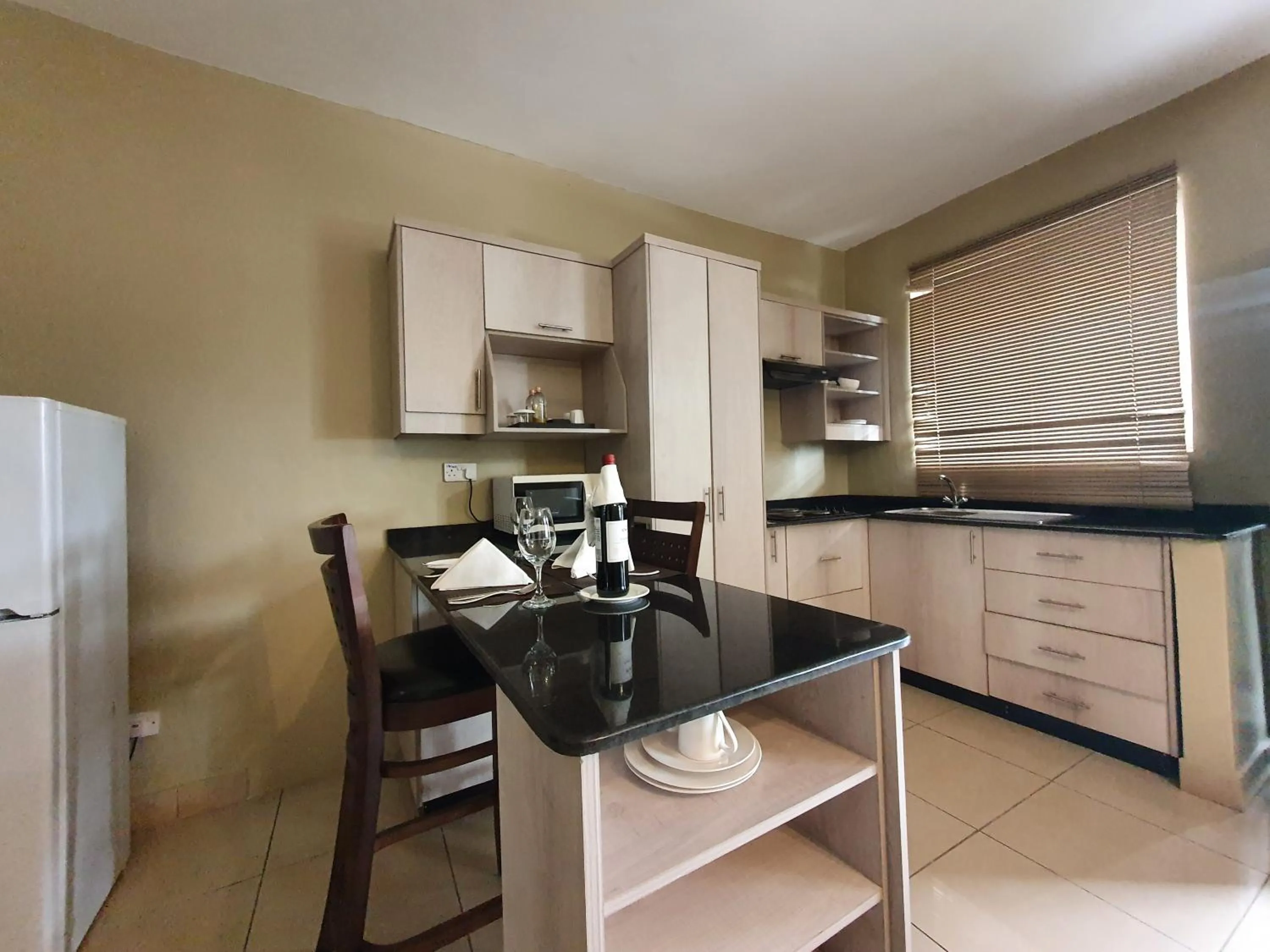 Kitchen or kitchenette in Serendib Suites and Conference Center