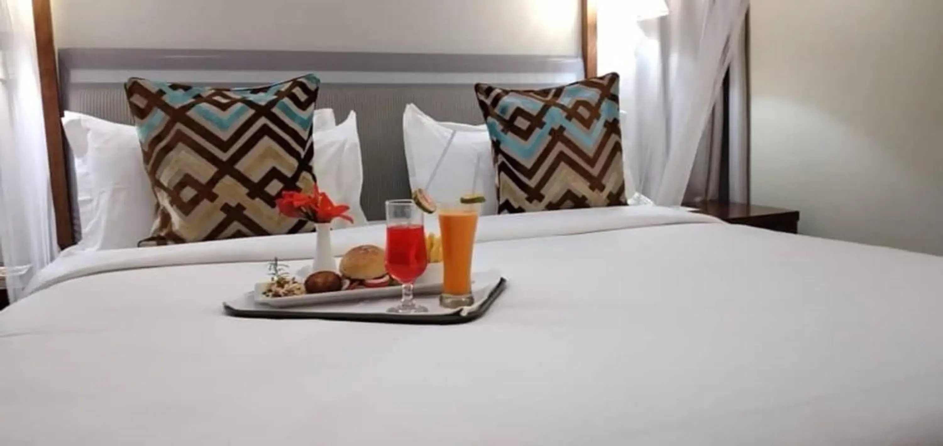 room service, Bed in Serendib Suites and Conference Center room service, Bed in Serendib Suites and Conference Center
