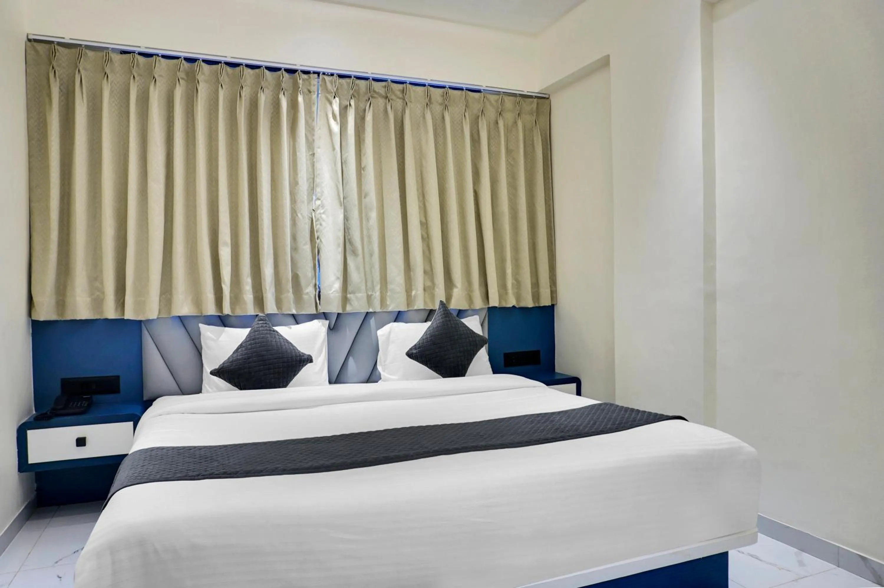 Bed in Palm Suites Baner- indian nationals only