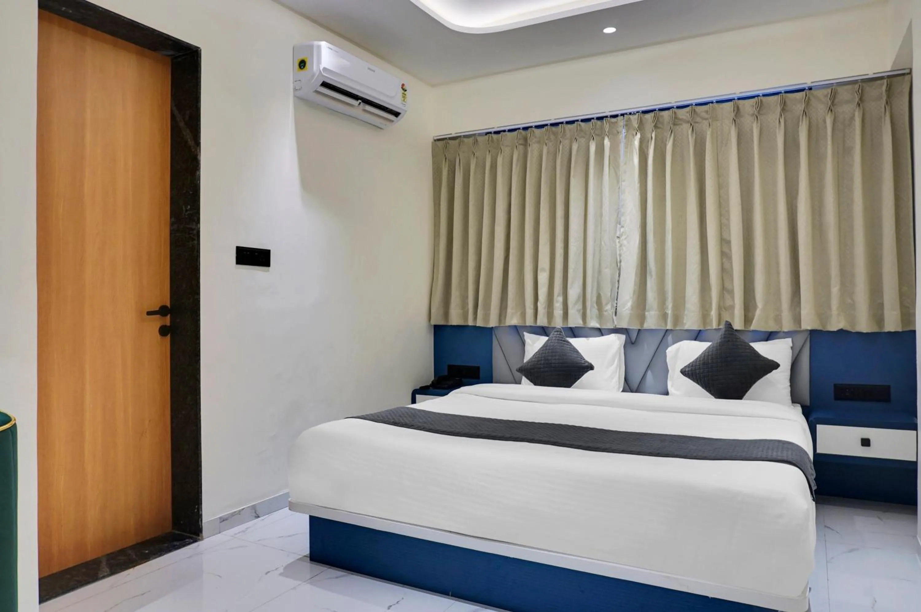 Bed in Palm Suites Baner- indian nationals only
