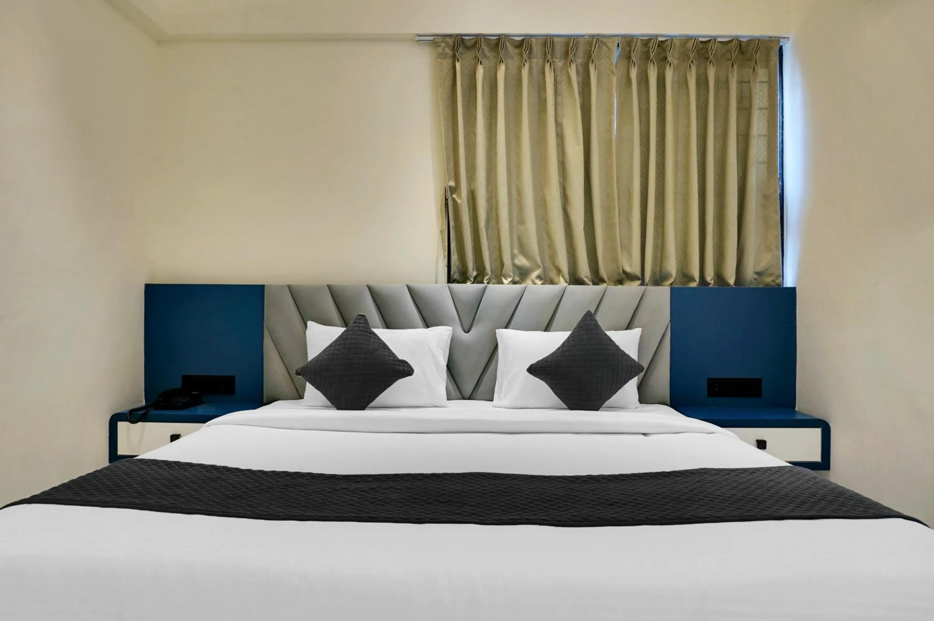 Bed in Palm Suites Baner- indian nationals only