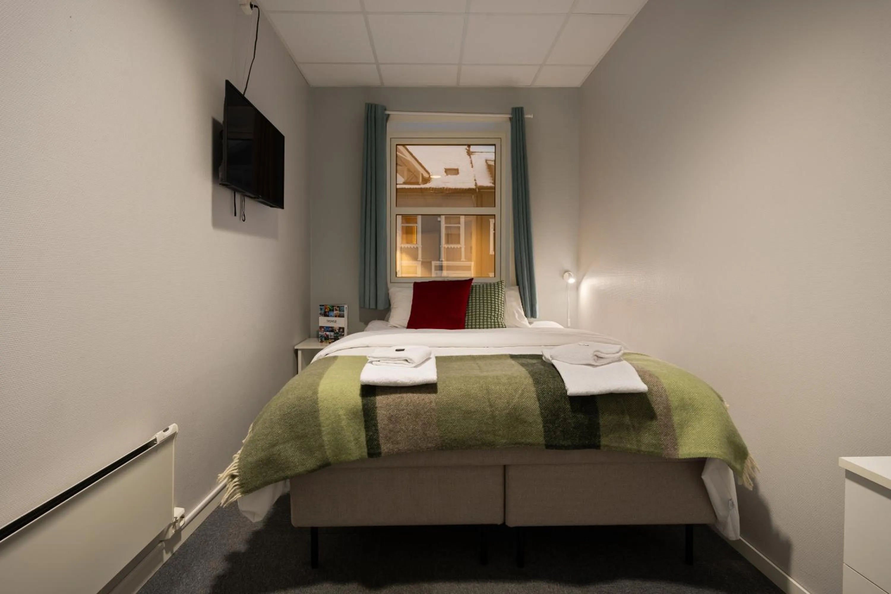 Bed in Enter Skansen Hotel